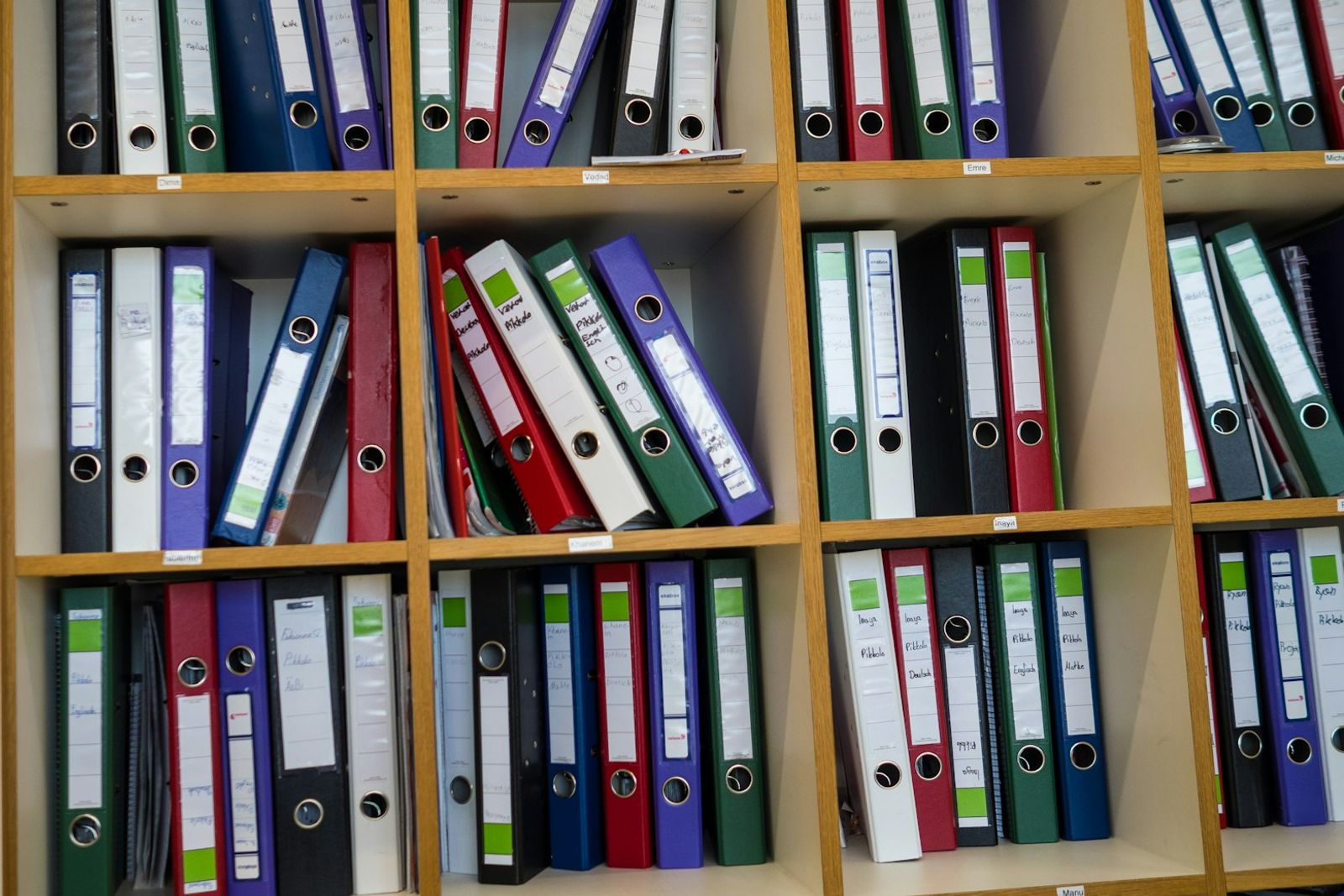 Shelves of labeled binders