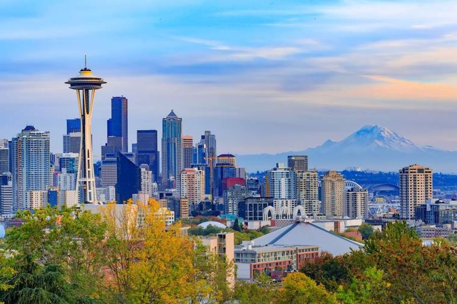 The Seattle skyline with the Space Needle and Mount Rainier beyond