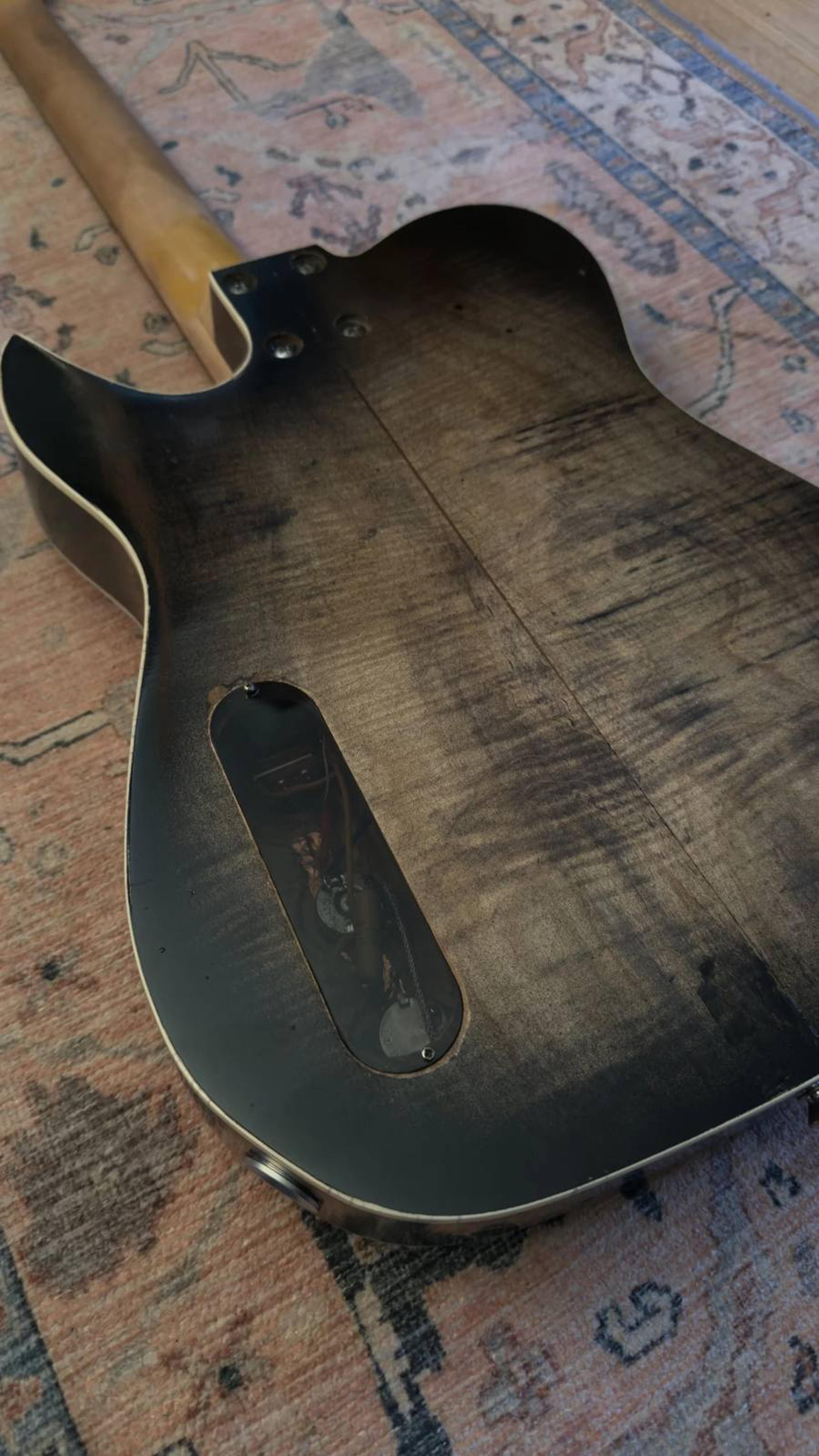 The Lost Model Thickline - Hollow body, flame maple cap, sycamore back, maple neck, rosewood board, Thomas Nilsen HB sized P90 neck, BKP Old Guard bridge, relic tobaccoburst paint, Double bound guitar from Blind Johns Guitars - back 1