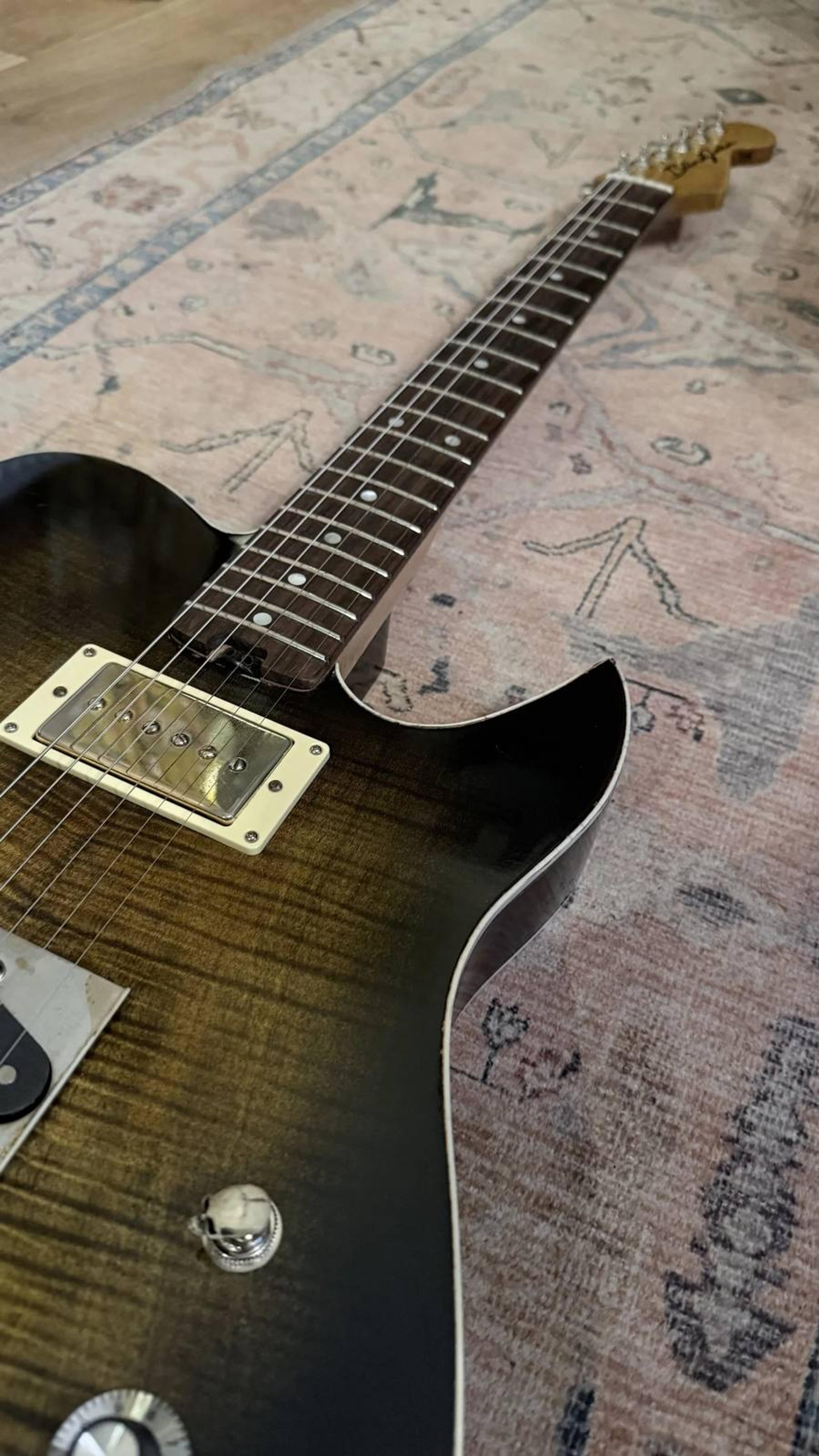 The Lost Model Thickline - Hollow body, flame maple cap, sycamore back, maple neck, rosewood board, Thomas Nilsen HB sized P90 neck, BKP Old Guard bridge, relic tobaccoburst paint, Double bound guitar from Blind Johns Guitars - horn 2