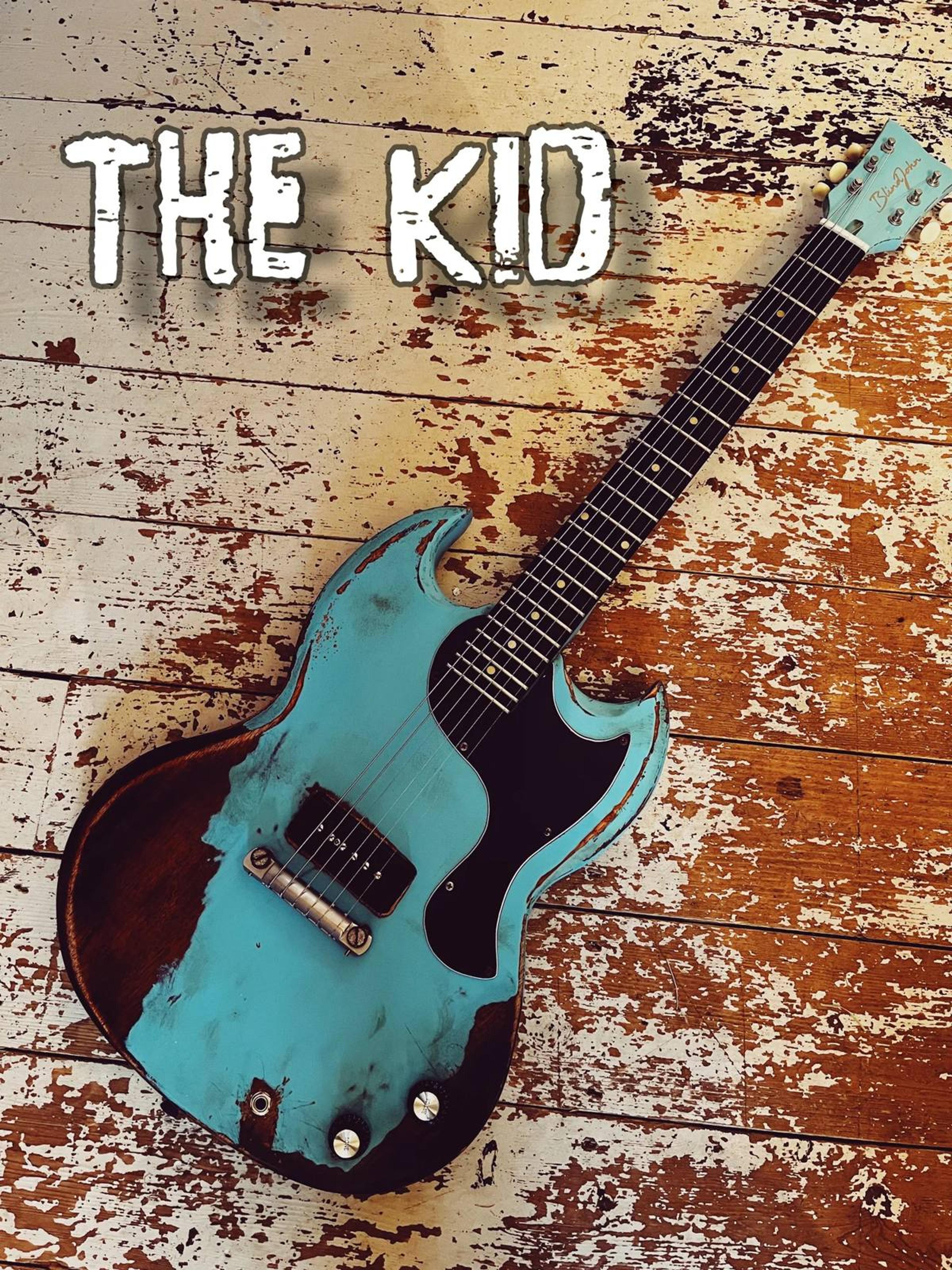 The Kid - SG Jnr style double cut - set neck - heavy relic Sonic blue no 2