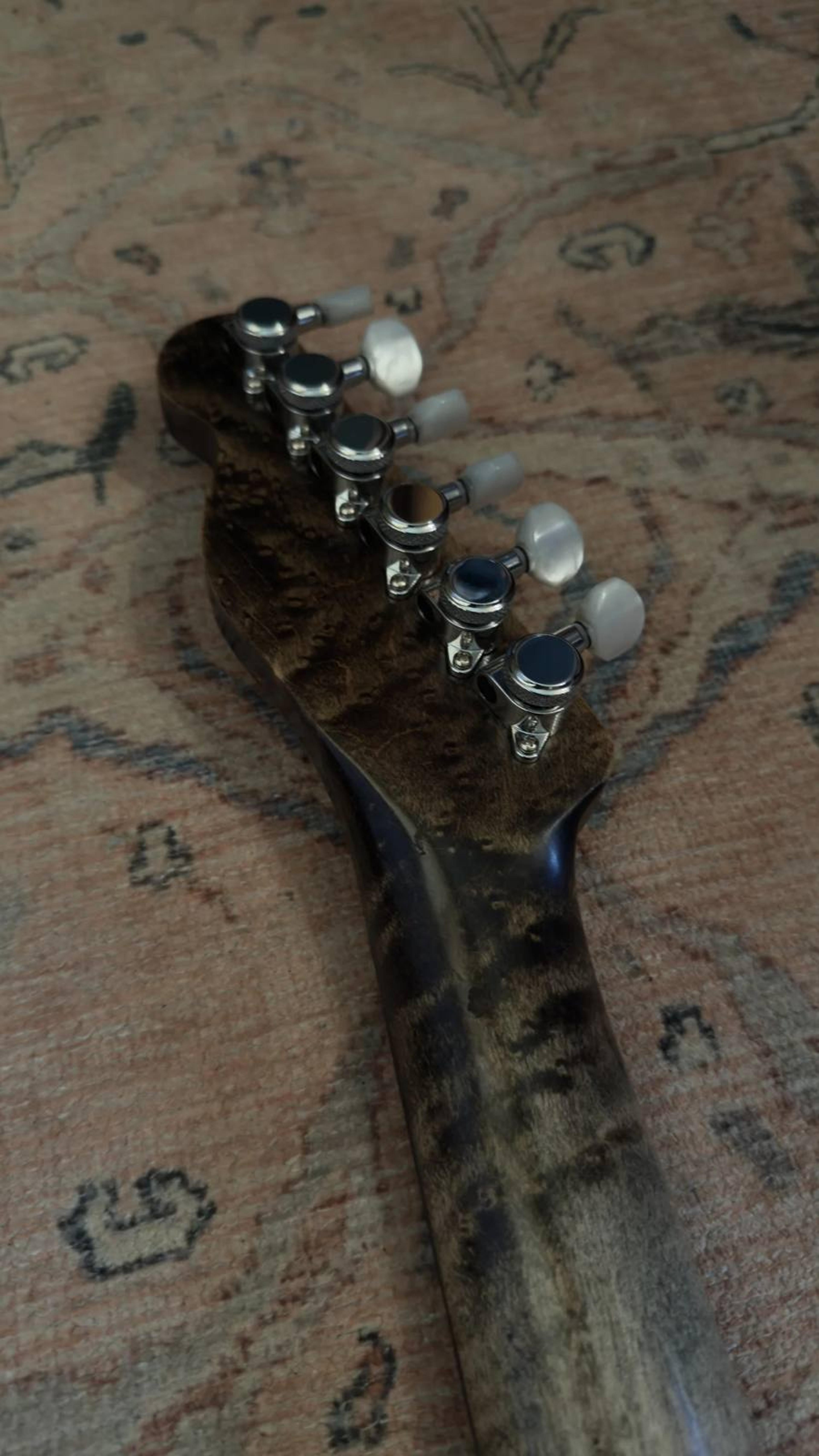 The Magpie - relic black Tele with white pearloid detail - headstock close up rear