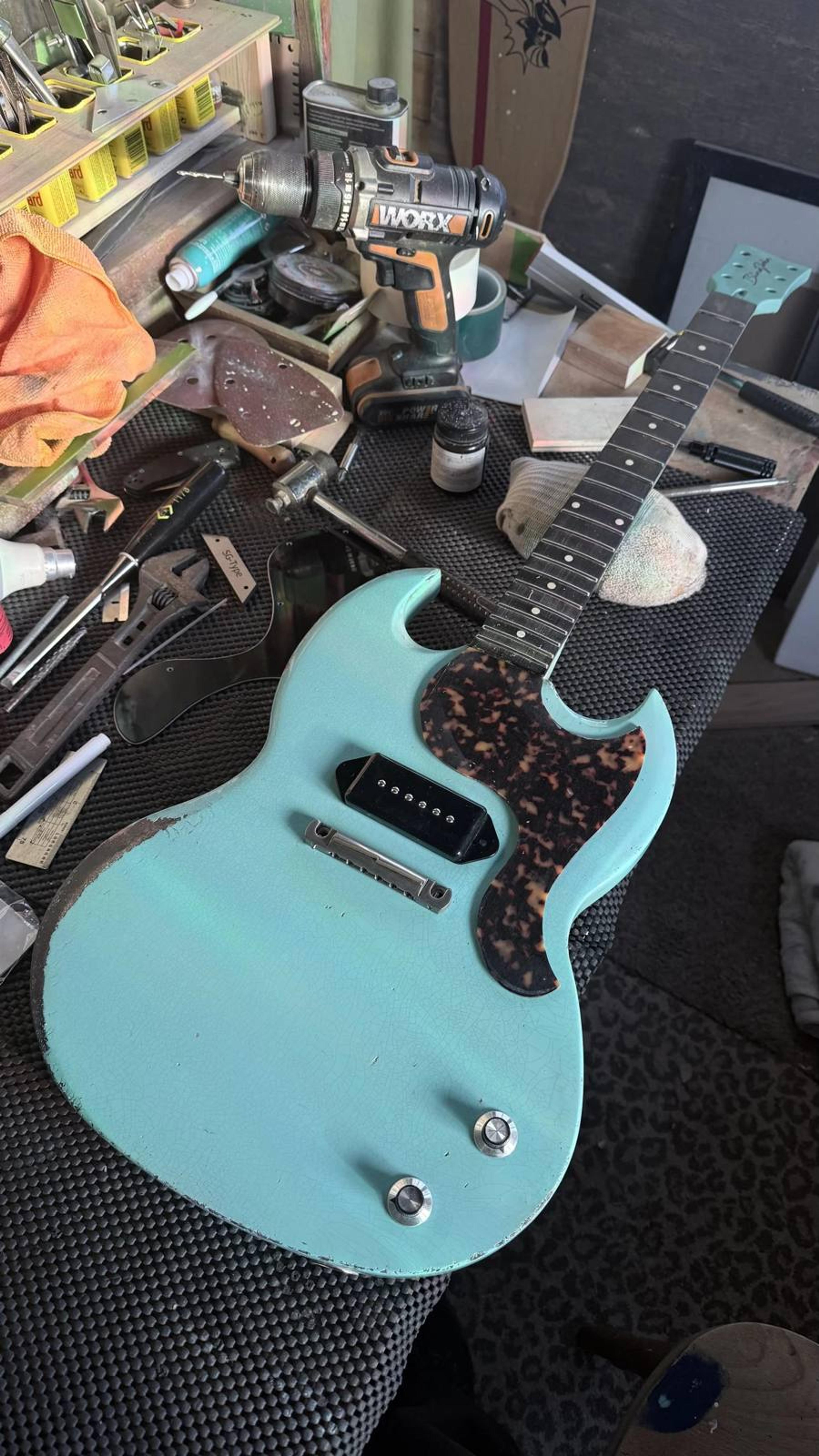 The Kid - SG Jnr style double cut - set neck - relic surf green with Tort celluloid acetate hand cut pickguard - Thomas Nilsen Dog Ear P90 - build shot 4
