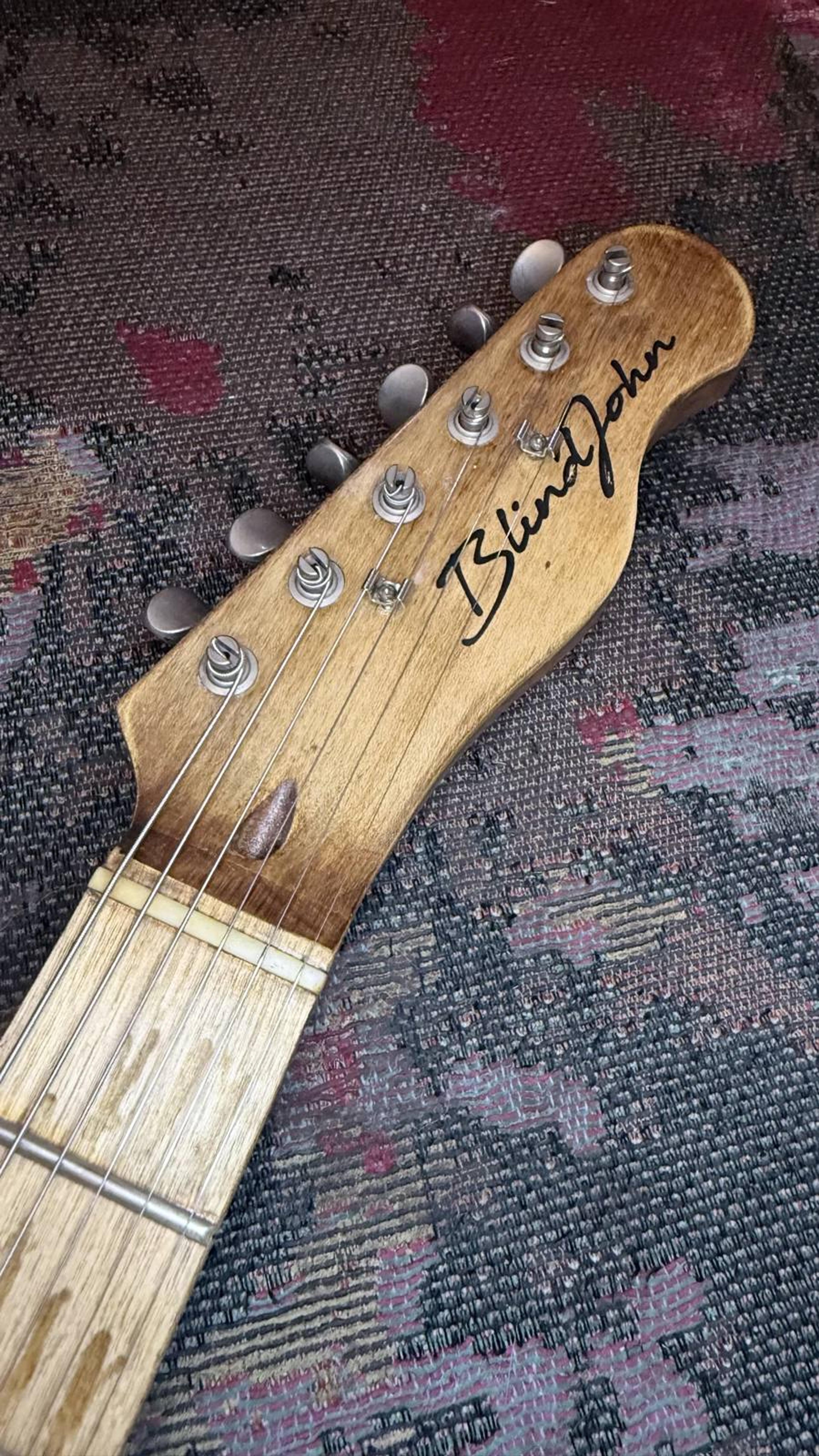The 107 by Blind John's Guitars