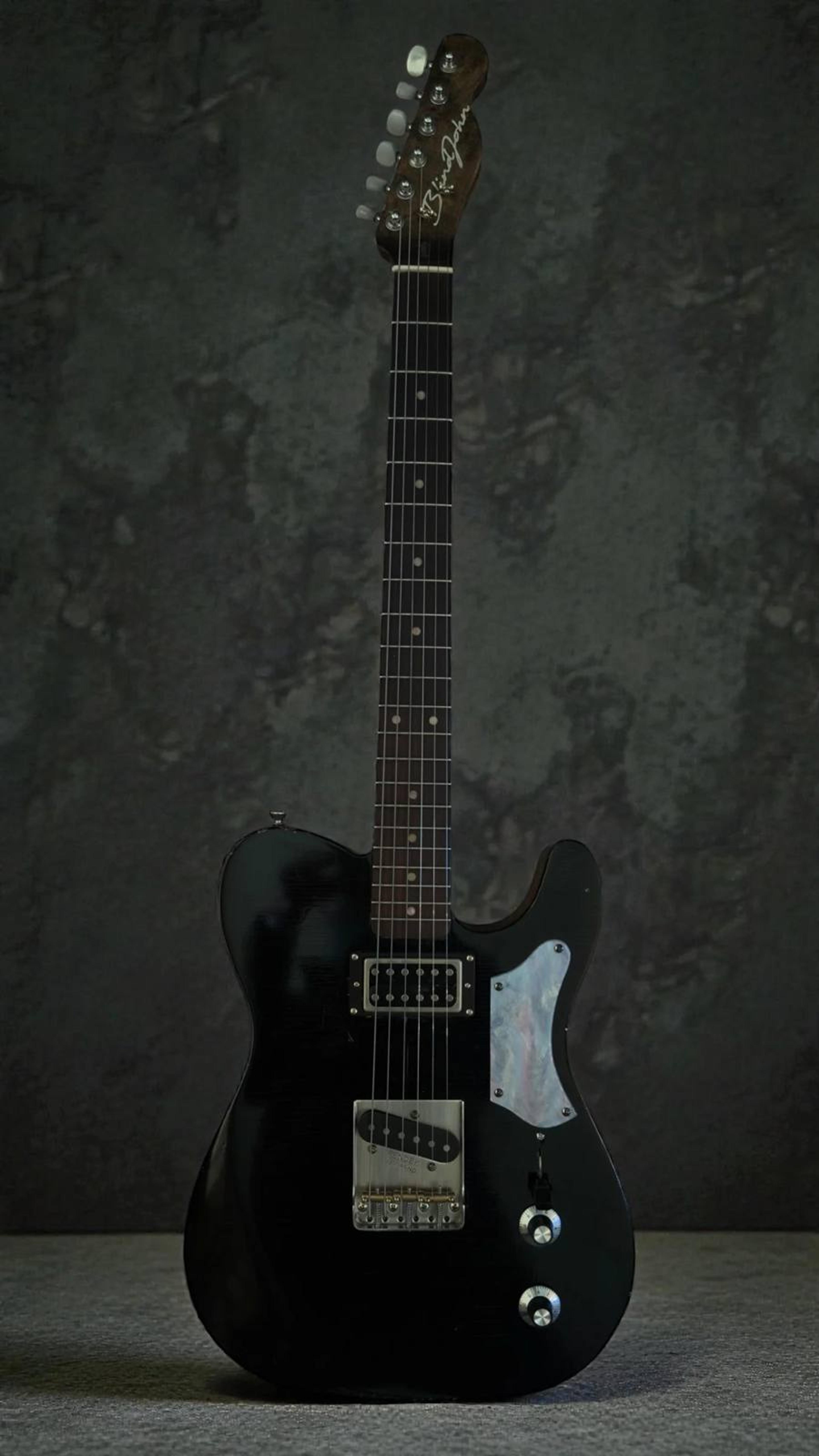 The Magpie - relic black Tele with white pearloid detail - swampified flame maple neck - studio shot 1