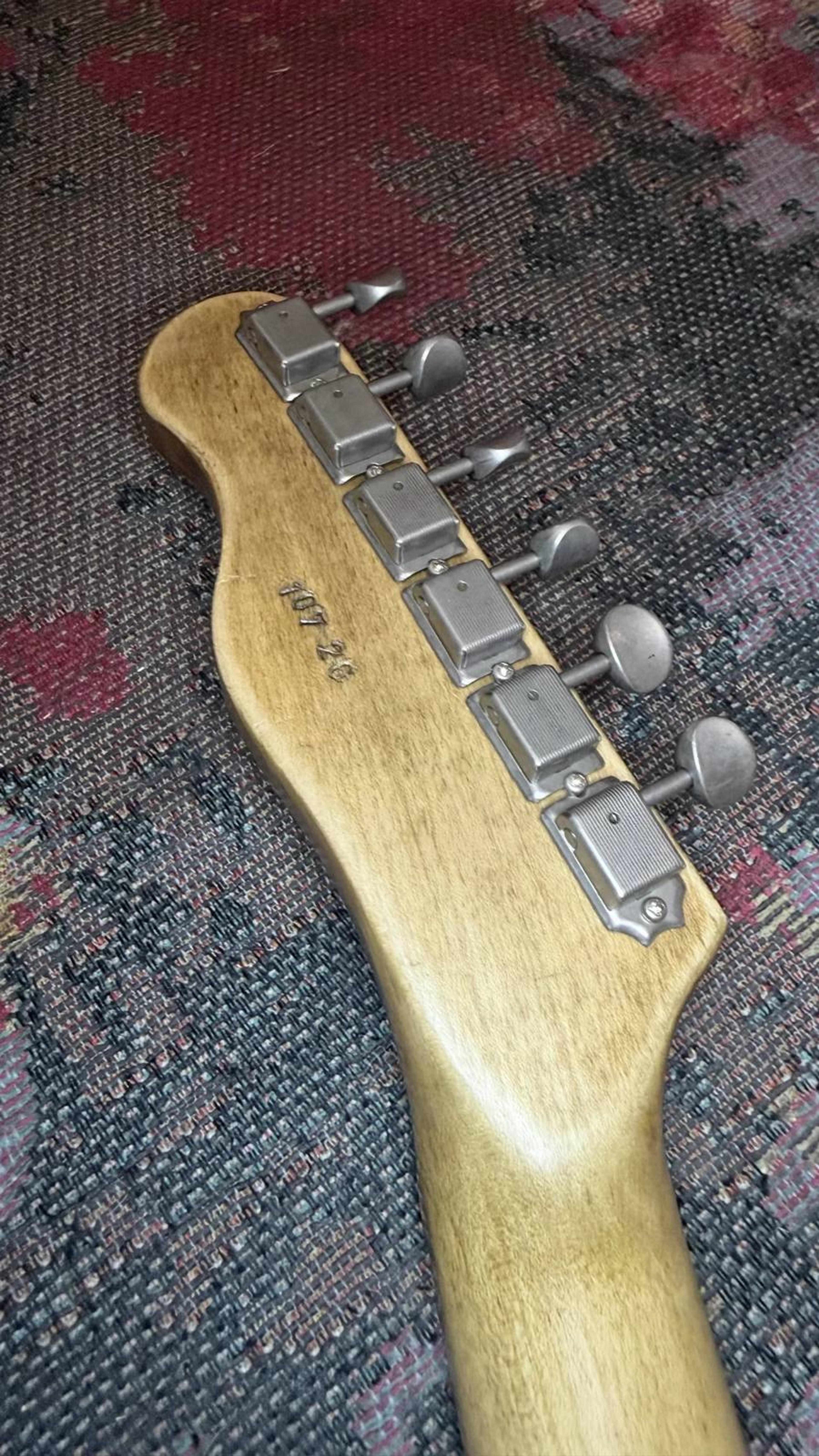 The 107 by Blind John's Guitars