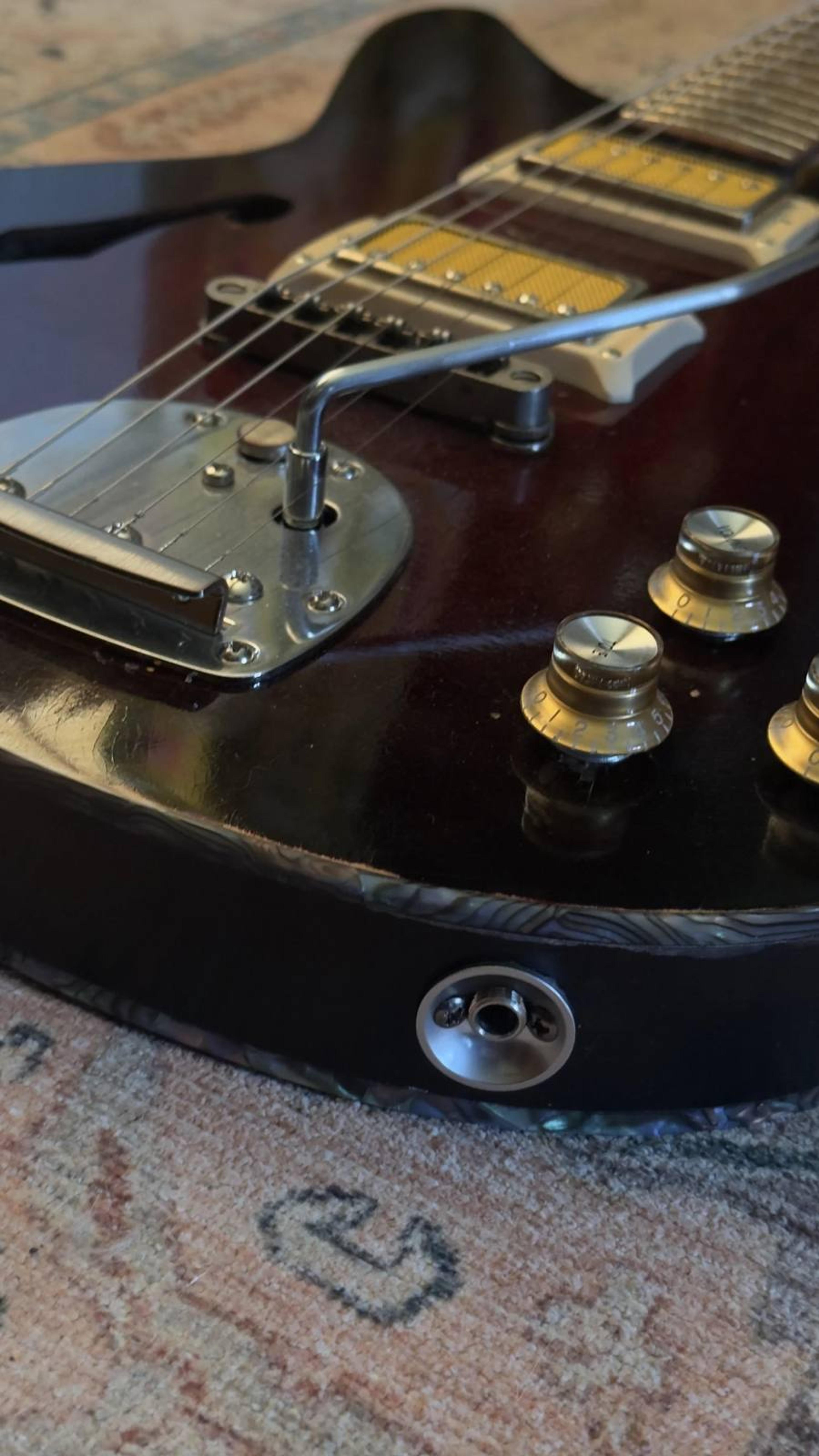 The DeVille - semi-hollow Offset custom guitar - 1 of 5 - Redburst Flame maple, roasted flame maple neck, satin grovers, jag style trem, Thomas Nilsen 'Big Goldie' pickups - jack detail