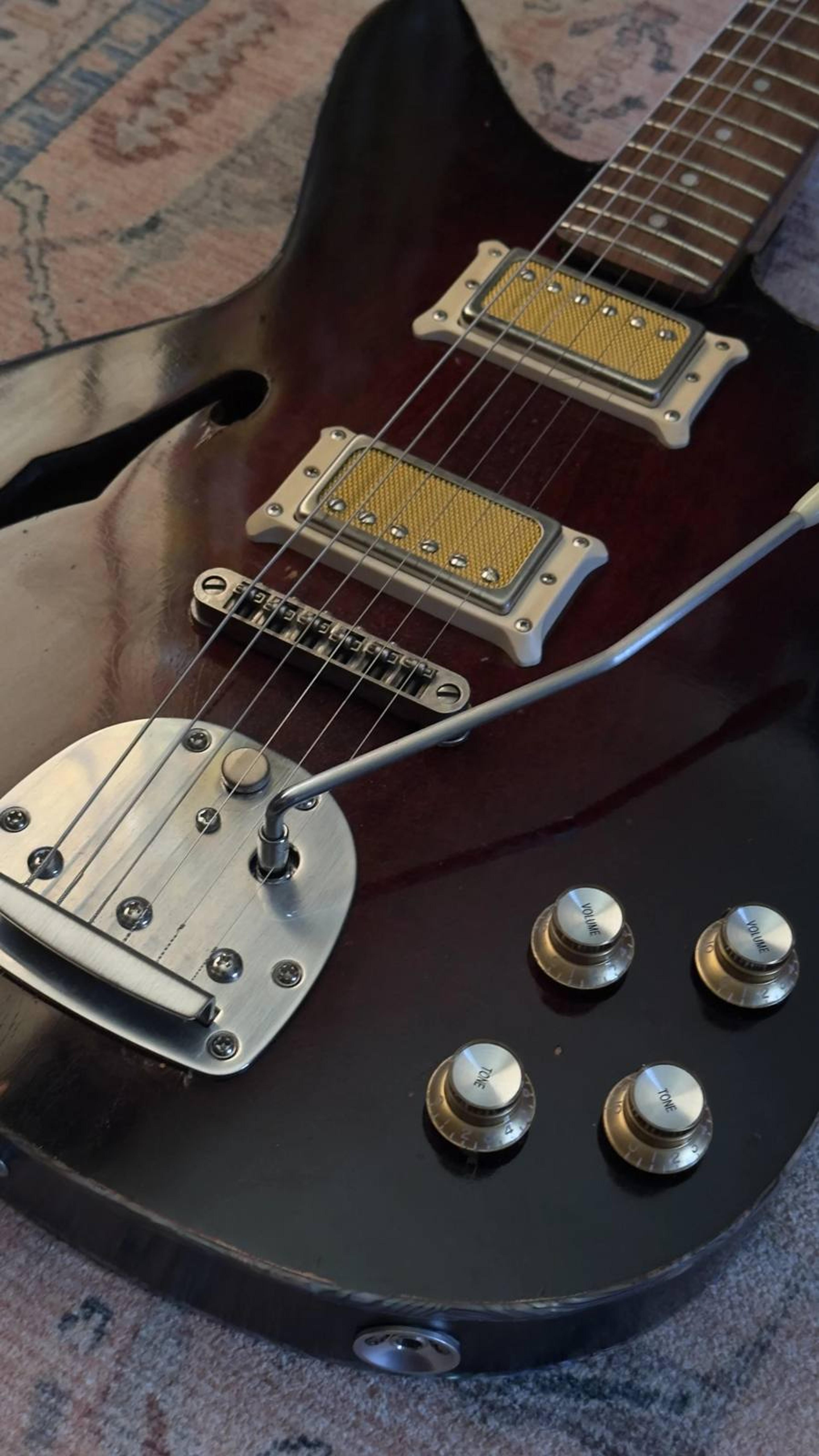 The DeVille - semi-hollow Offset custom guitar - 1 of 5 - Redburst Flame maple, roasted flame maple neck, satin grovers, jag style trem, Thomas Nilsen 'Big Goldie' pickups - body close up 1