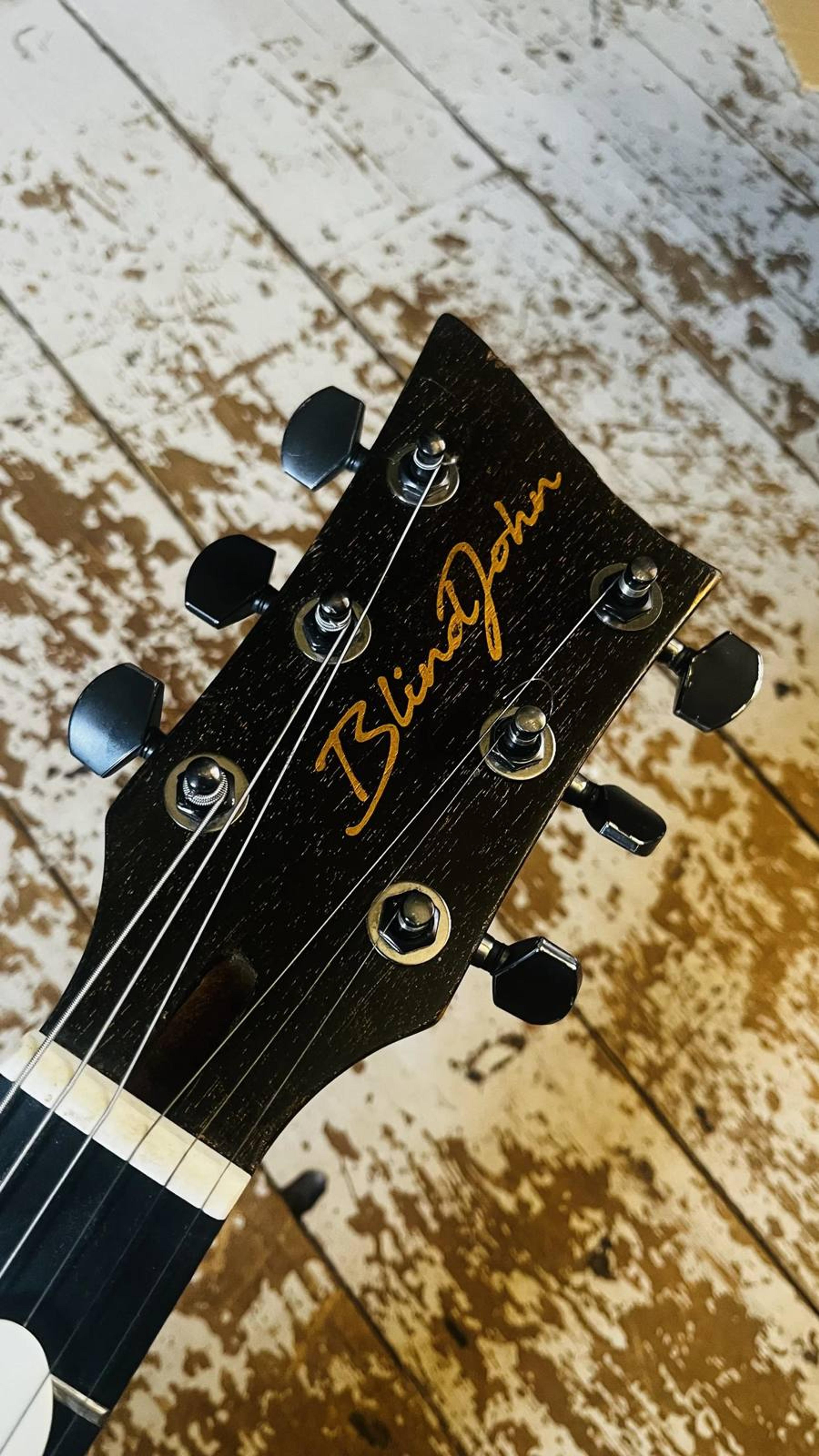 The Rebel Custom - LP Jnr style single pickup set neck custom guitar in Red Sparkle over black metallic - Bareknuckle Mule Humbucker - Faber Bridge - heavy checked hand relic'd nitrocellulose paint - headstock 2