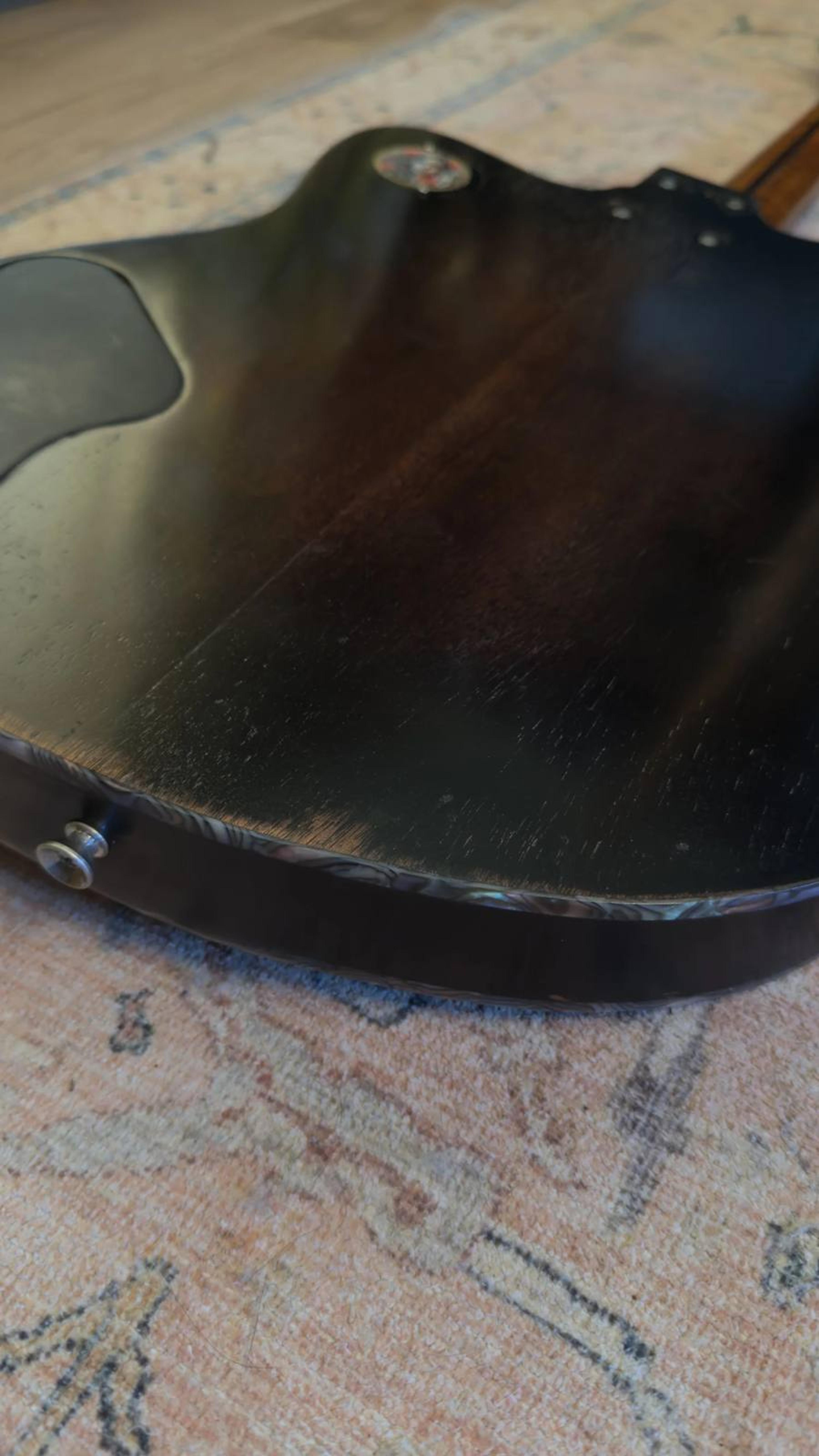 The Magpie - relic black Tele with white pearloid detail - swampified flame maple neck - rear base detail