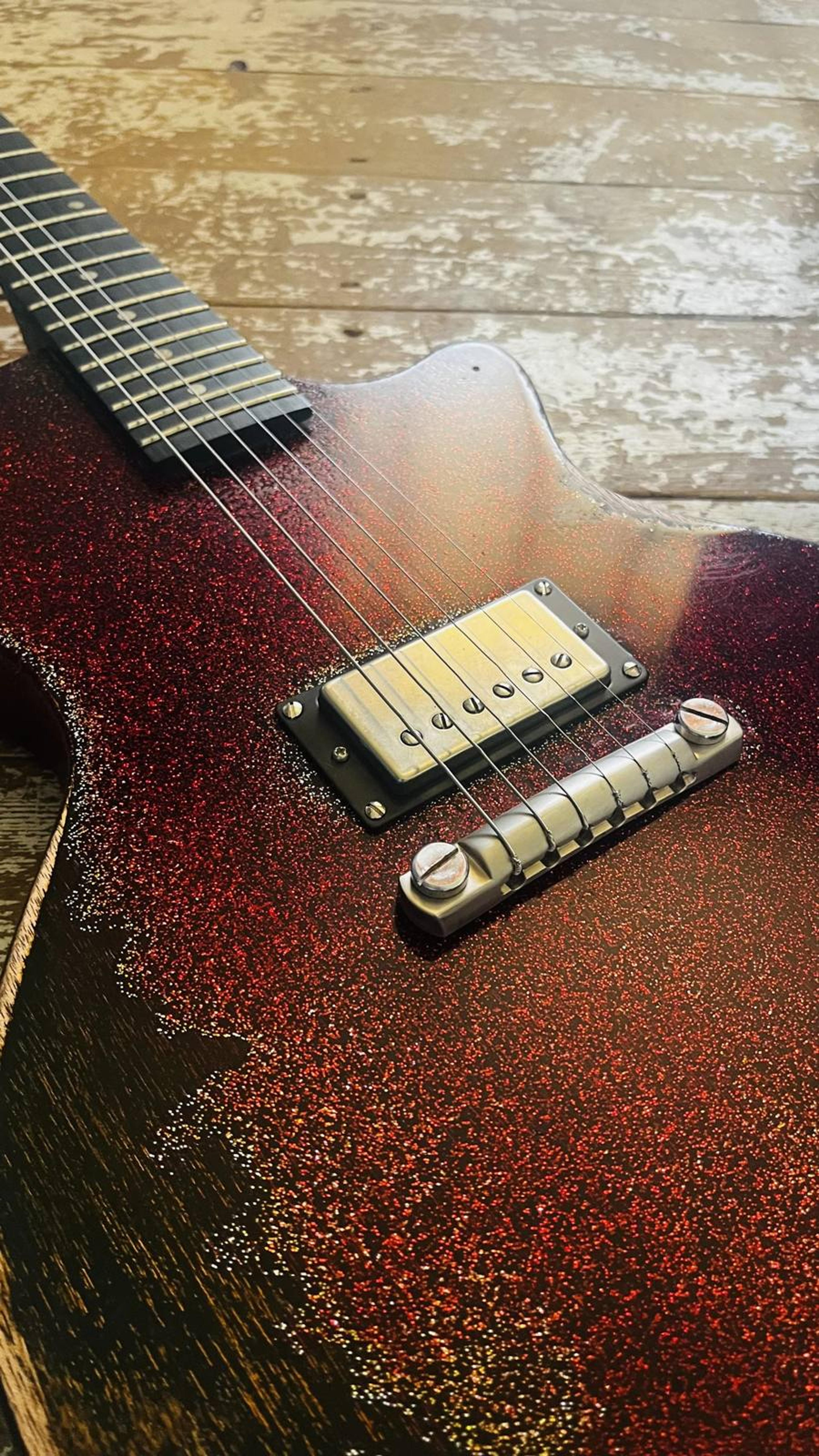 The Rebel Custom - LP Jnr style single pickup set neck custom guitar in Red Sparkle over black metallic - Bareknuckle Mule Humbucker - Faber Bridge - heavy checked hand relic'd nitrocellulose paint - body detail