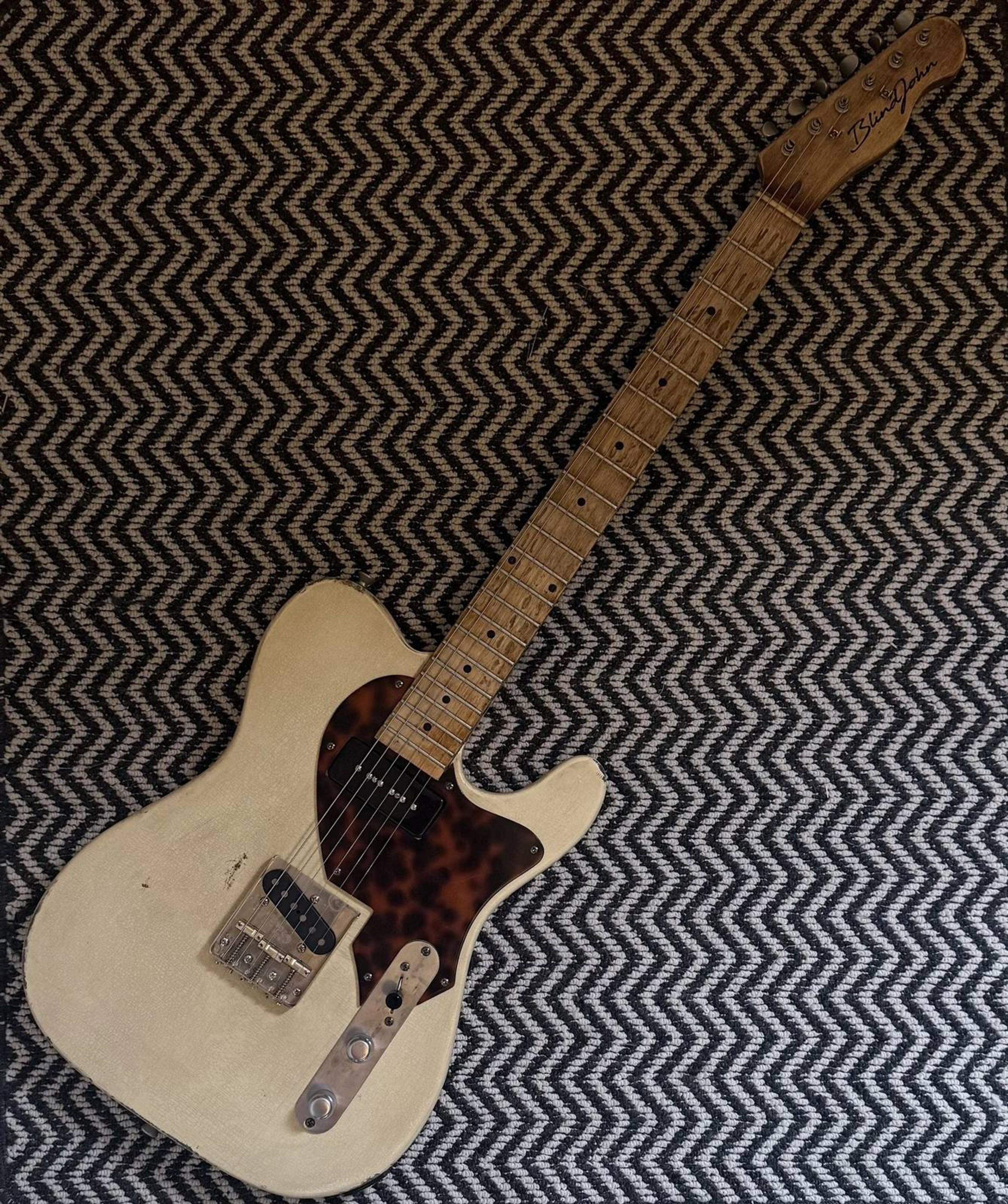 The 107 by Blind John's Guitars