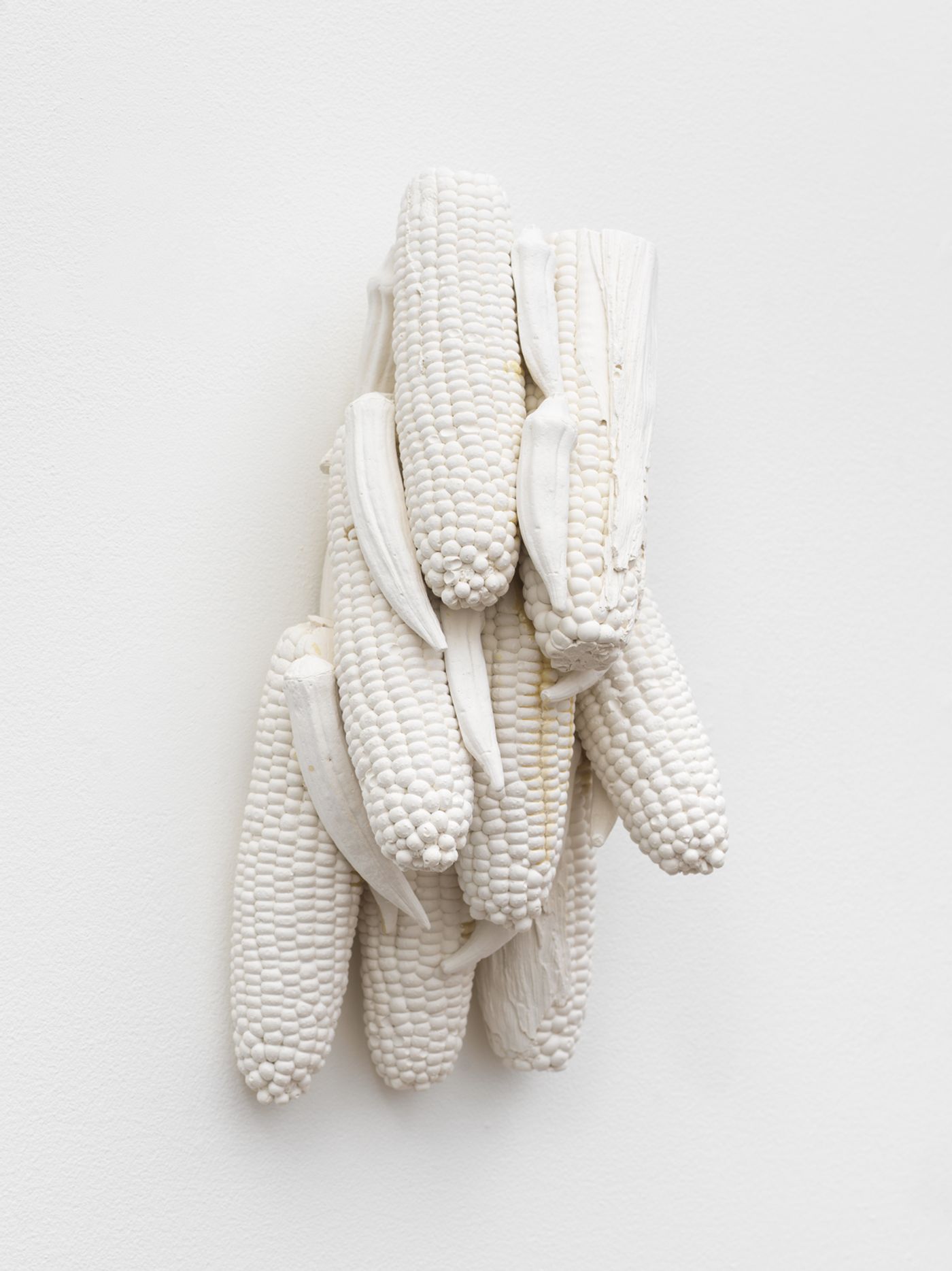 Image of African/American Still Life Composition with Eight Corn and Okra, 2022: Plaster and wood
