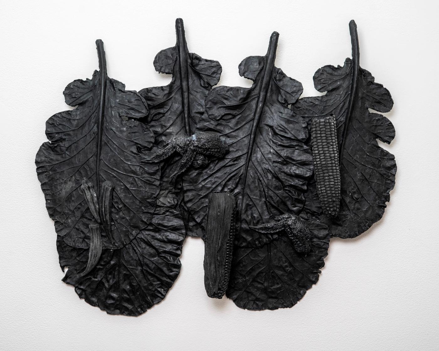 Image of Still Life with Five Large Collard Leaves, Two Corn Cobbs, Three Okra Pods, and Three Chicken Wings, 2026: Polyurethane and acrylic