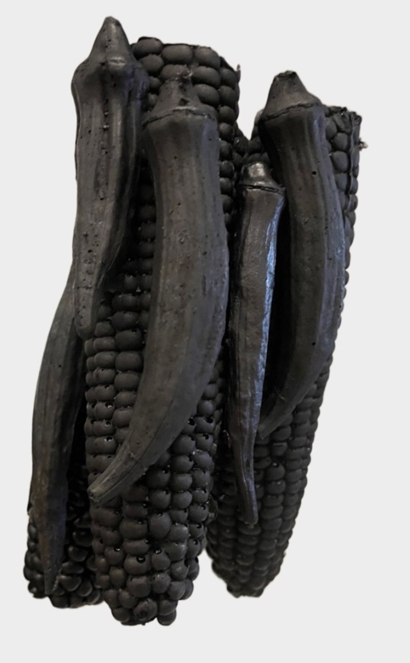 Image of Still Life with Three Corn Cobbs and Five Okra Pods, 2026: Polyurethane and acrylic
