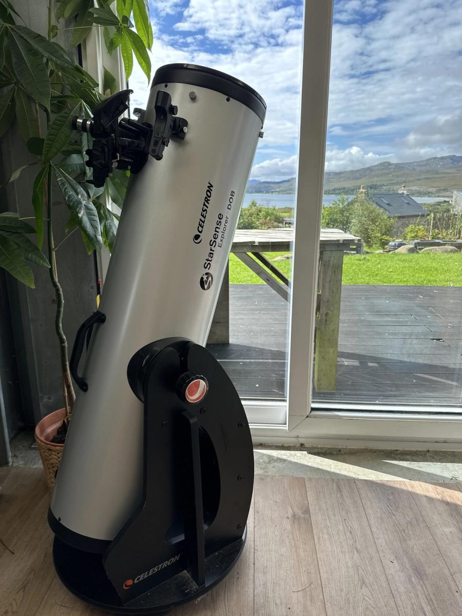 The 10-inch Dobsonian telescope set up at the shed doors at Bothan Jura Retreat, Isle of Jura, looking out over the loch and hills