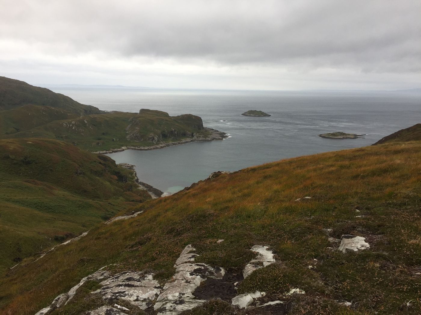 Looking down from the north end of Jura over Pig Bay, its skerries and the open sound beyond
