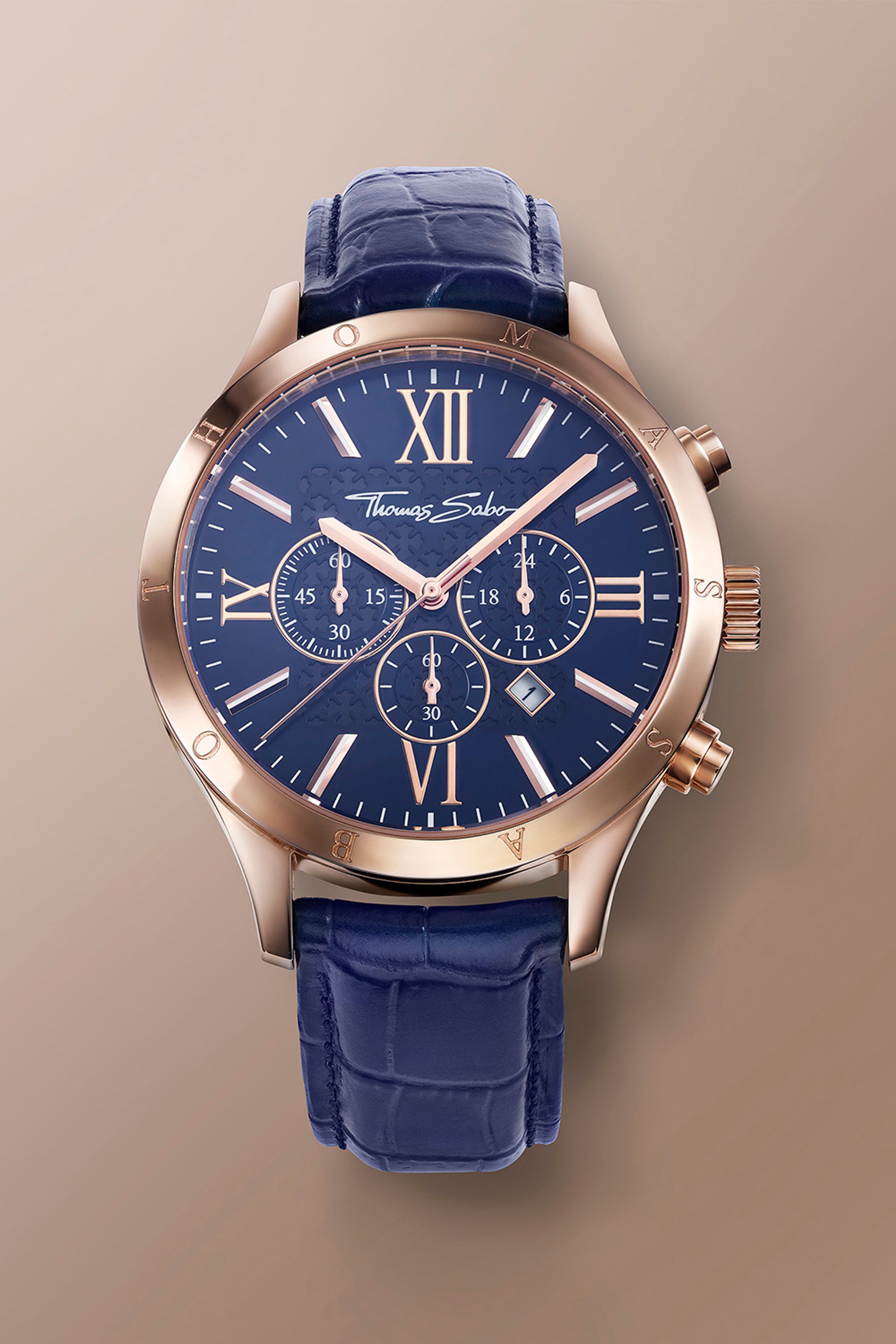 Roségoldfarbene Uhr mit blauem Lederarmband