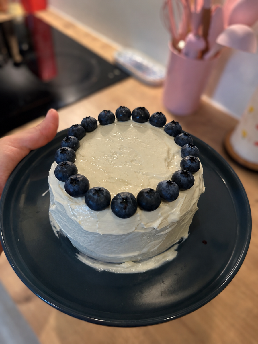 Homemade sugar-free first birthday cake with blueberries