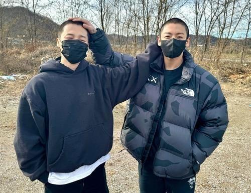 BTS’ Jimin (L) and Jungkook are seen in this photo captured from the band’s official X page. (PHOTO NOT FOR SALE) (Yonhap)