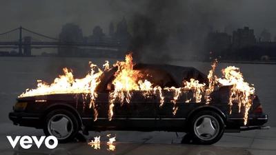 A vintage Saab burns in slow motion