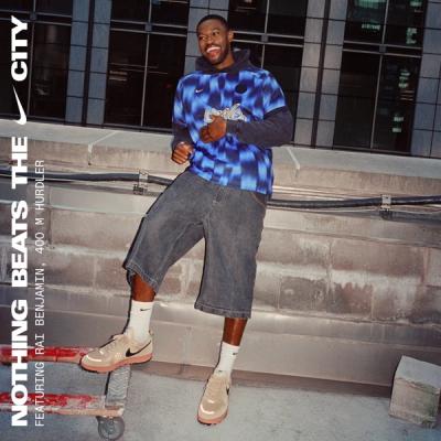 Rai Benjamin leaning against a wall