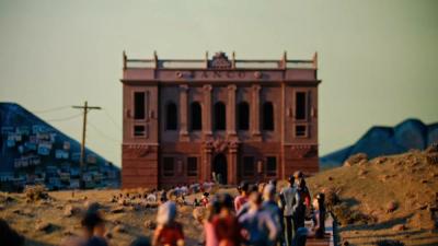 a miniatures set shows a bank in the desert