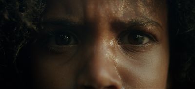 A young athlete looks into the camera