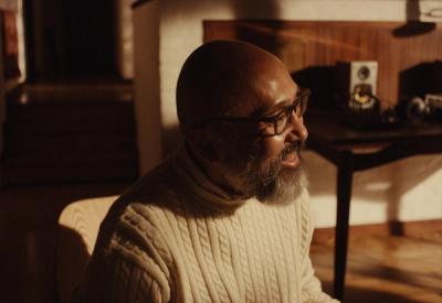 violin teacher working with student