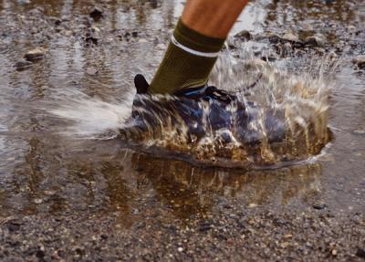 sneaker splashing in water