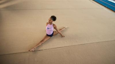 gymnast practicing her floor routine