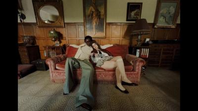 A couple sitting on the couch