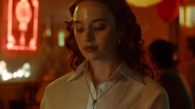 Woman eating spicy ramen