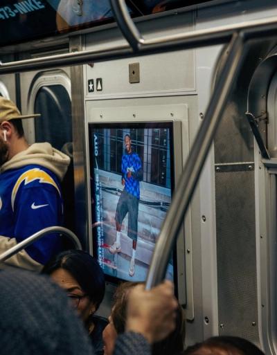Photo billboard on subway