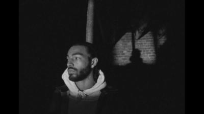 Sage Elsesser poses in a black and white photograph