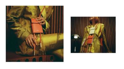 model with designer handbag