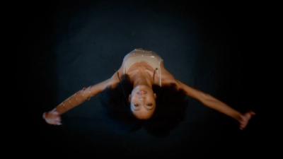 A young woman dances ballet