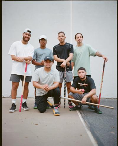 group portrait of stickball players