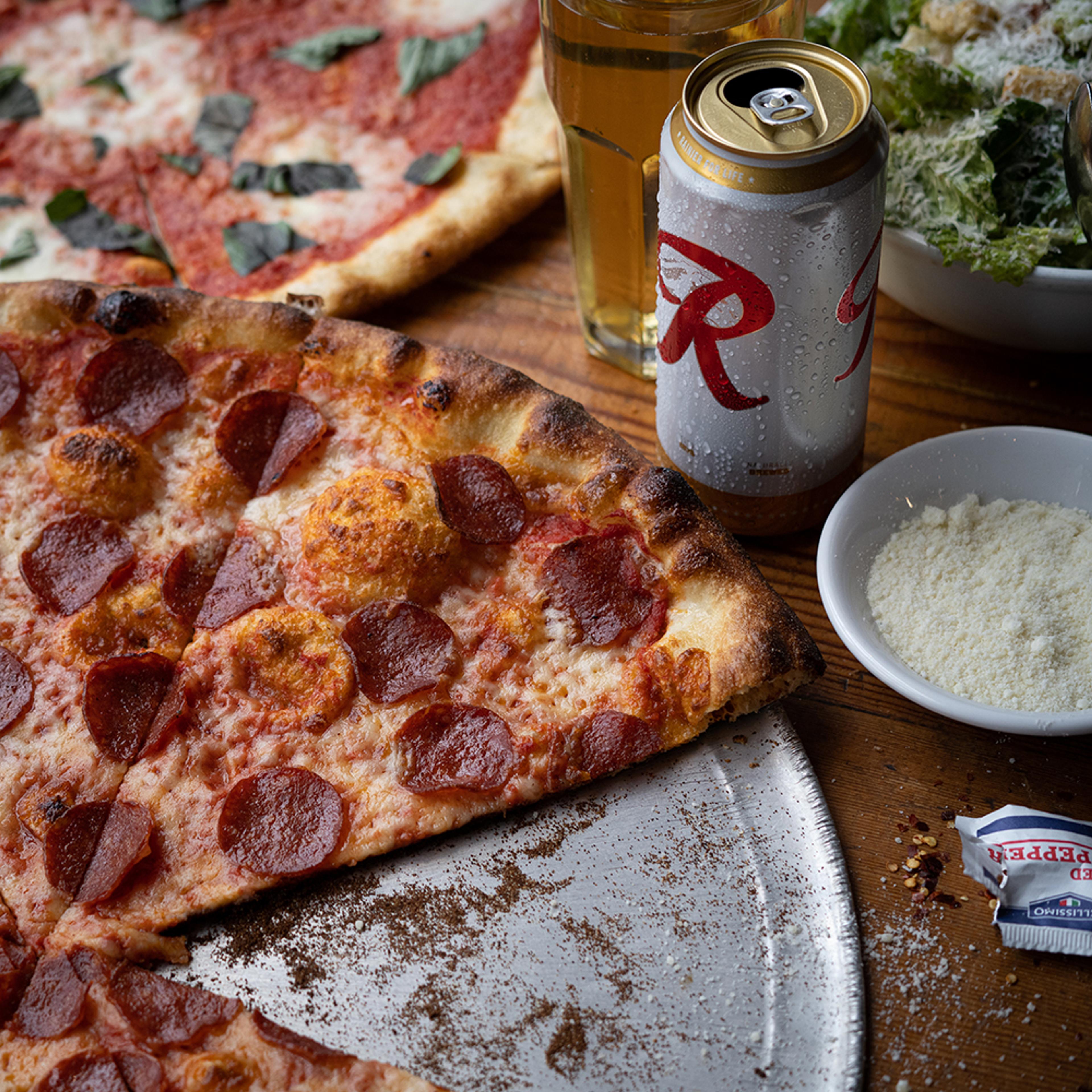 pepperoni pizza with rainier beer tallboy