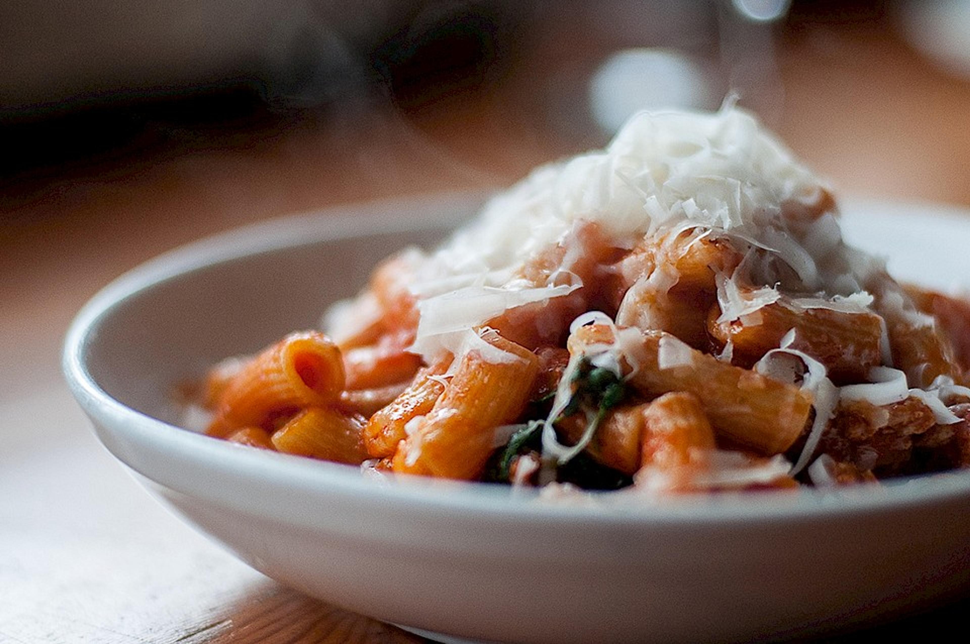 Rigatoni with tomato, spicy sausage, marjoram, parmigiano reggiano