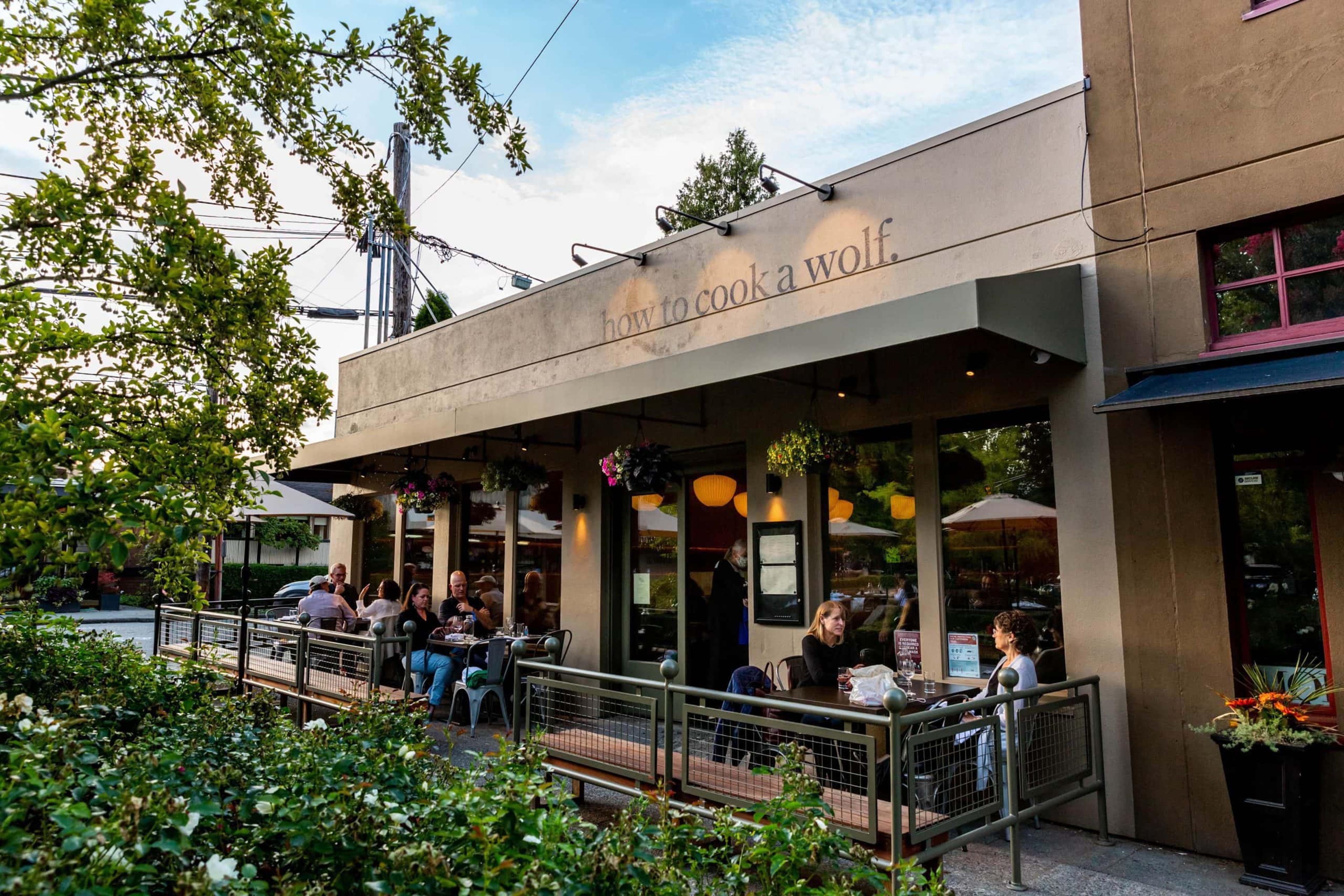 How to Cook A Wolf storefront patio dining area