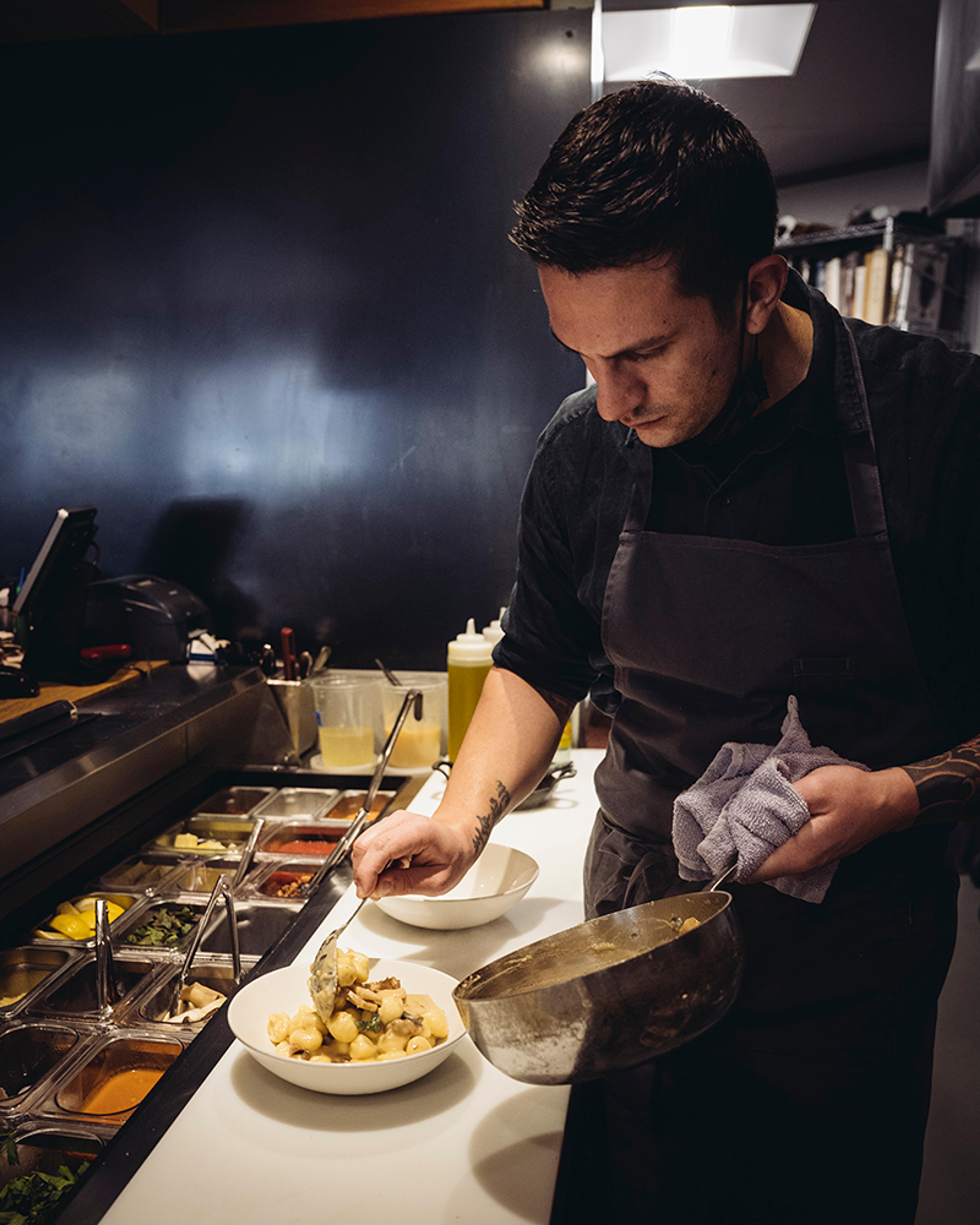 chef plating potato gnocchi