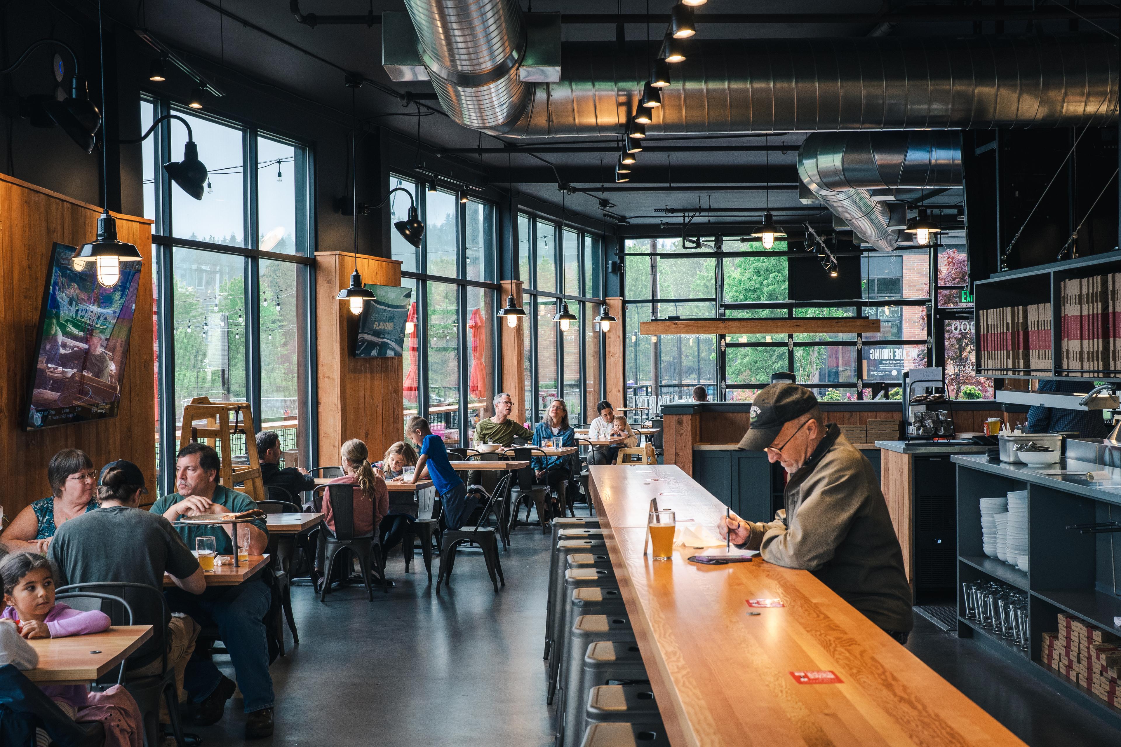 Customers sitting and eating at Ballard Pizza Co. (Woodinville)