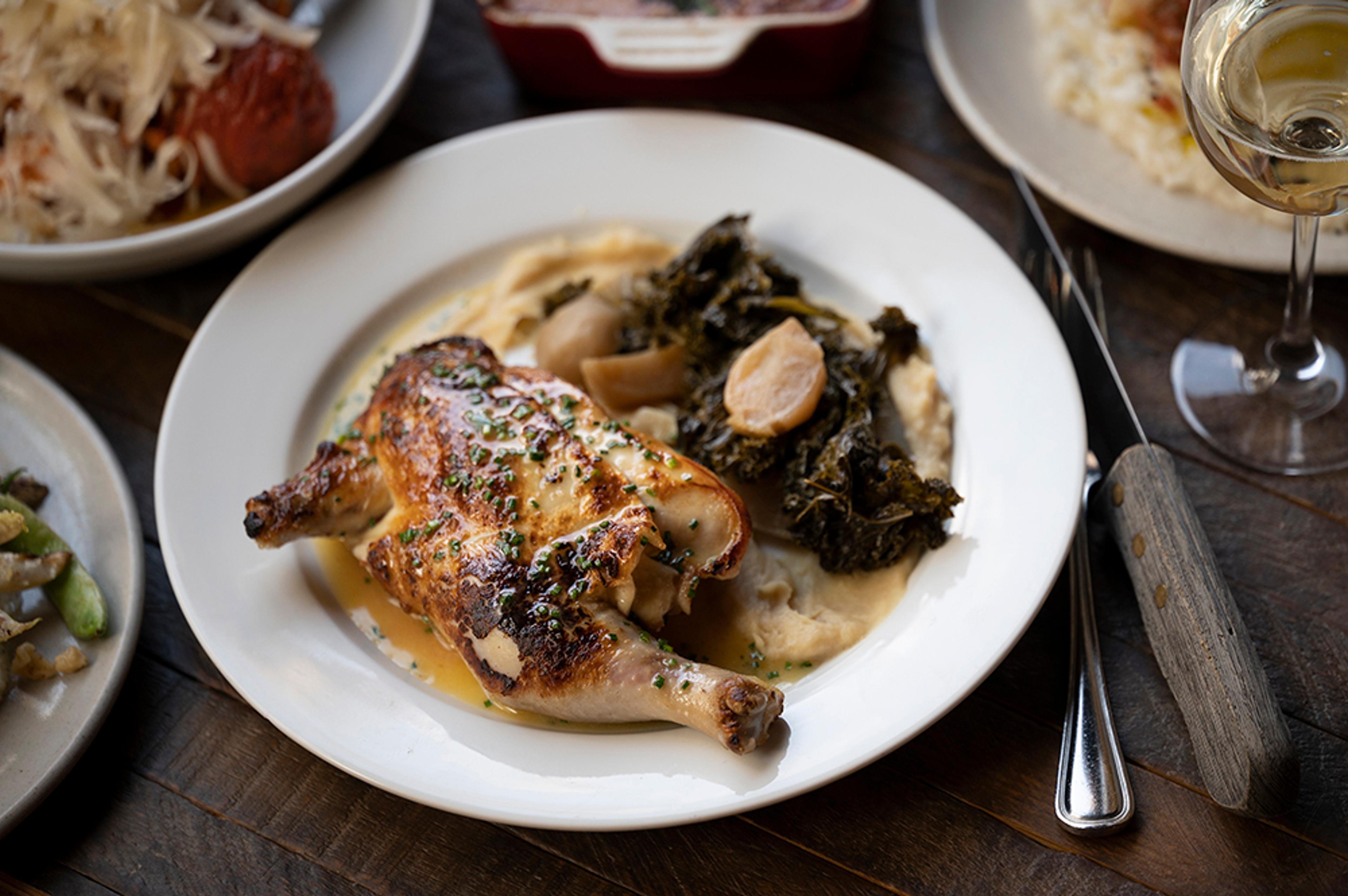 Half roasted chicken with turnips and braised greens