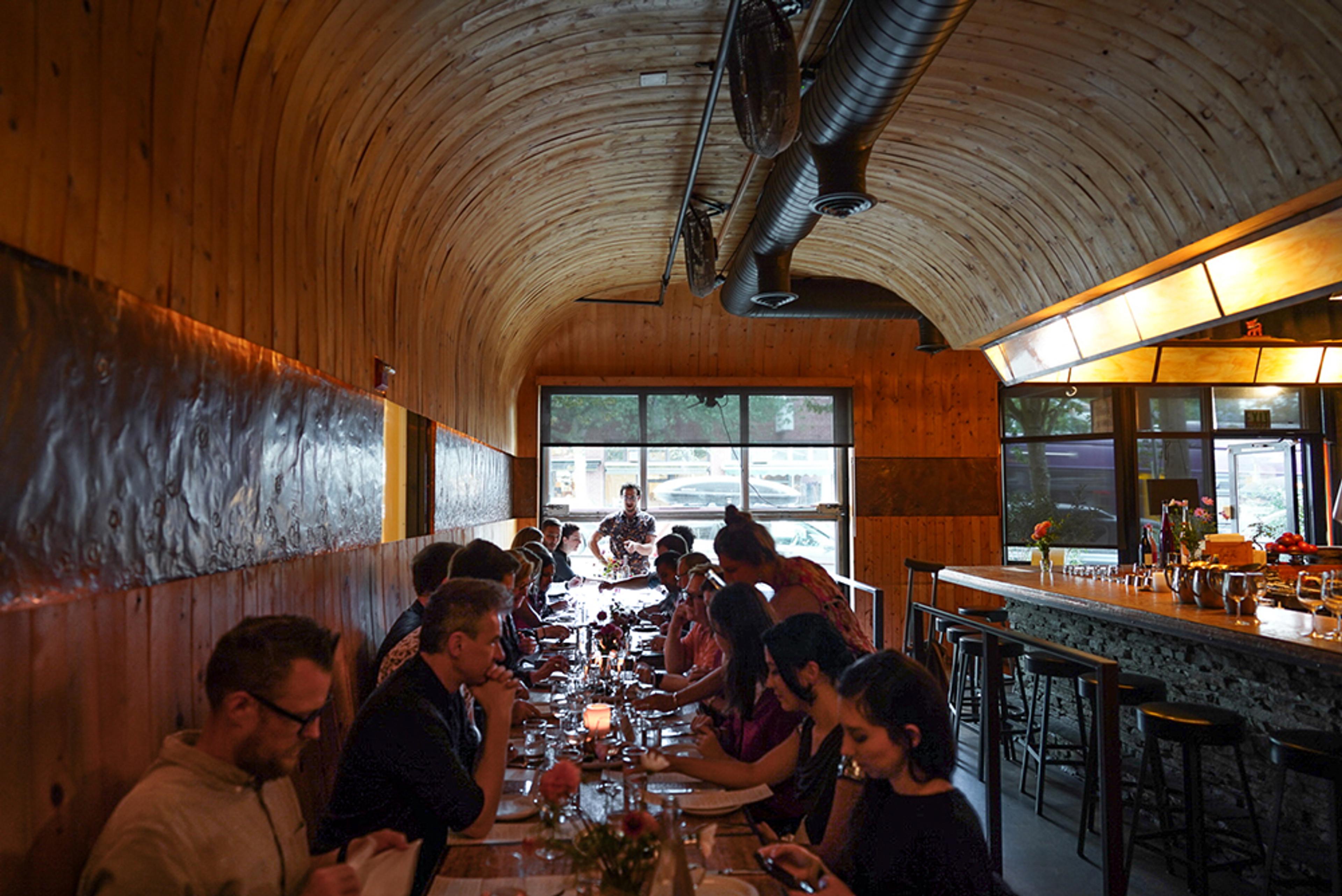 Restaurant interior with curved wood ceilings 