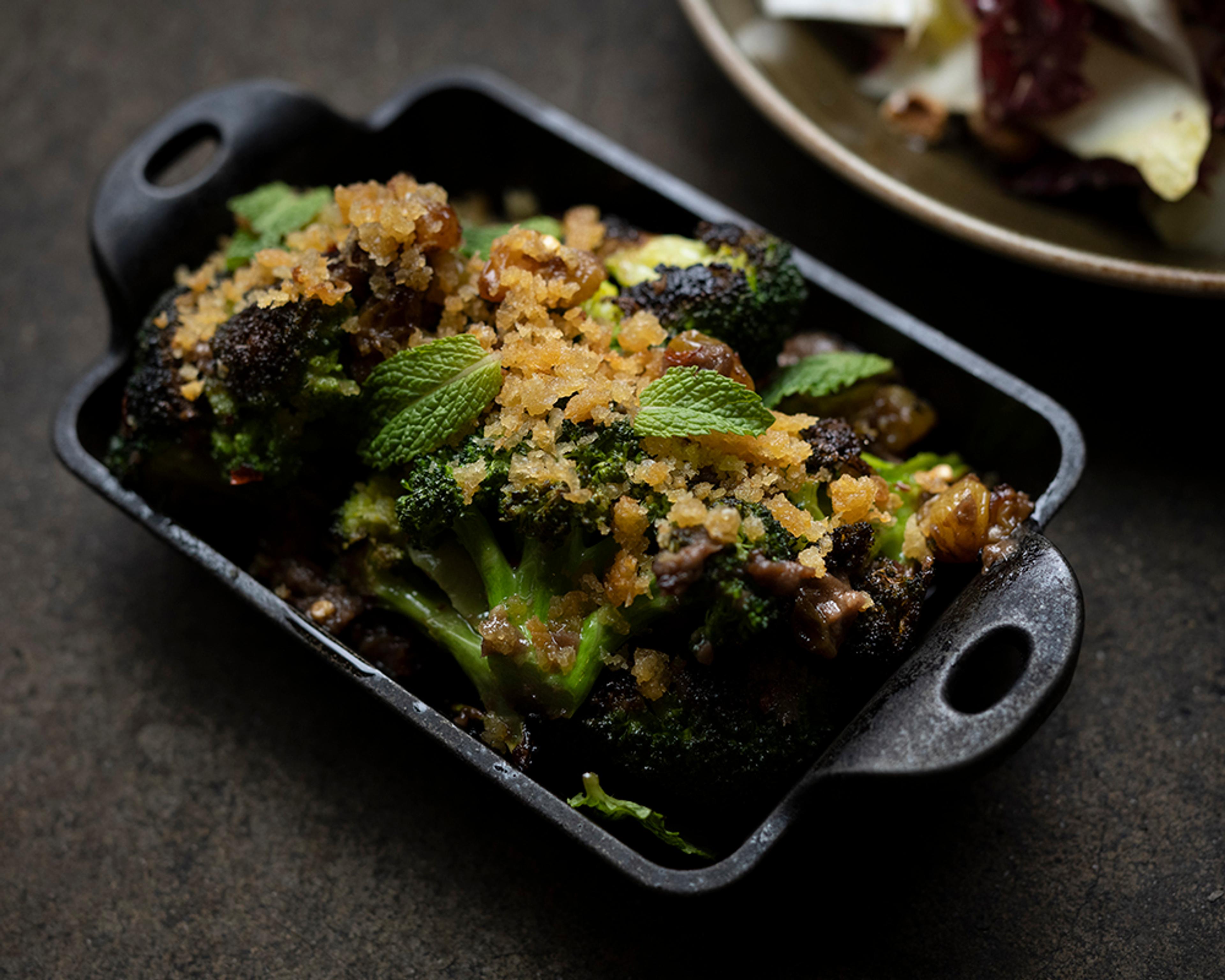 Roasted broccoli with raisins, mint, bread crumbs 