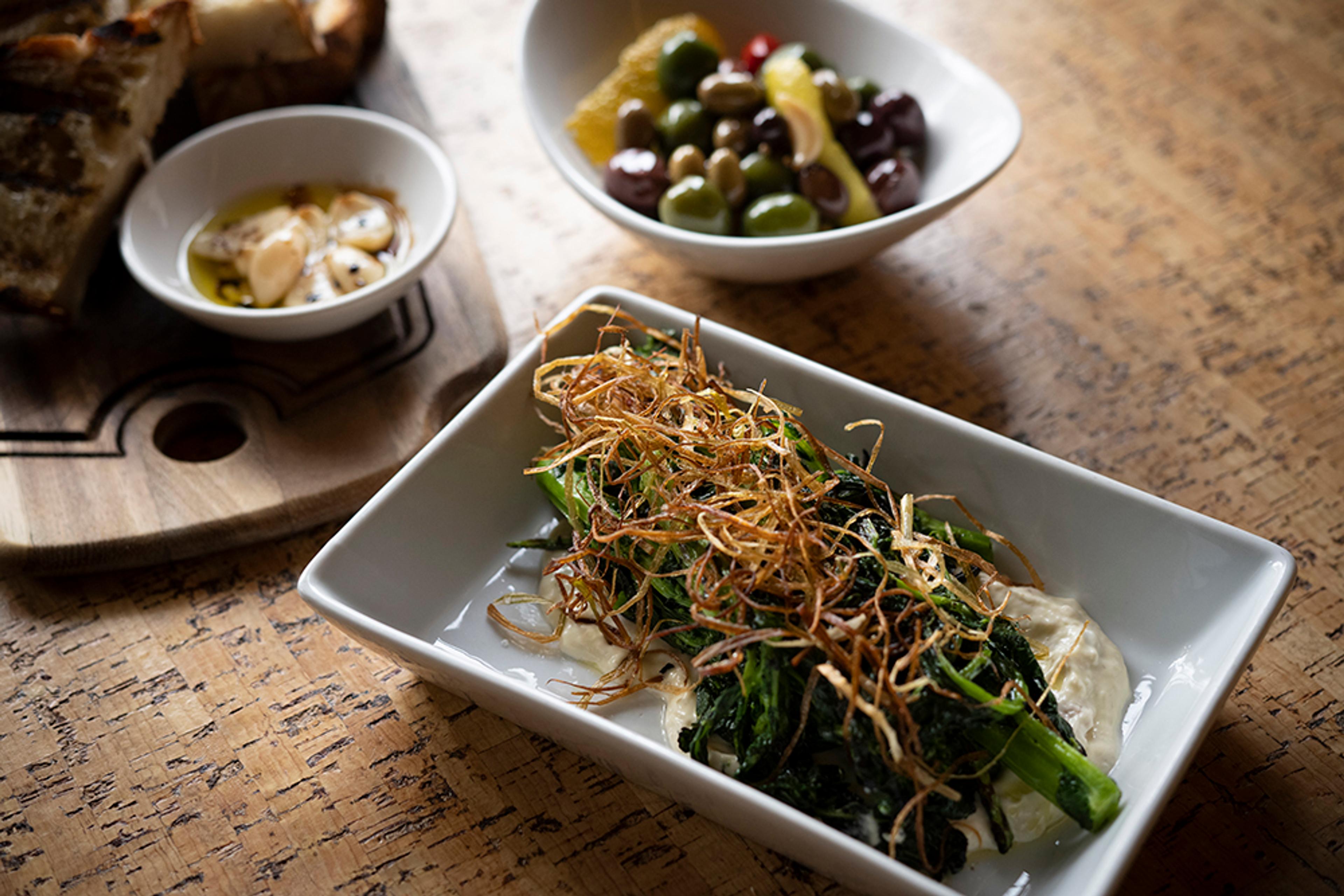 roasted rapini topped with shaved fried leeks