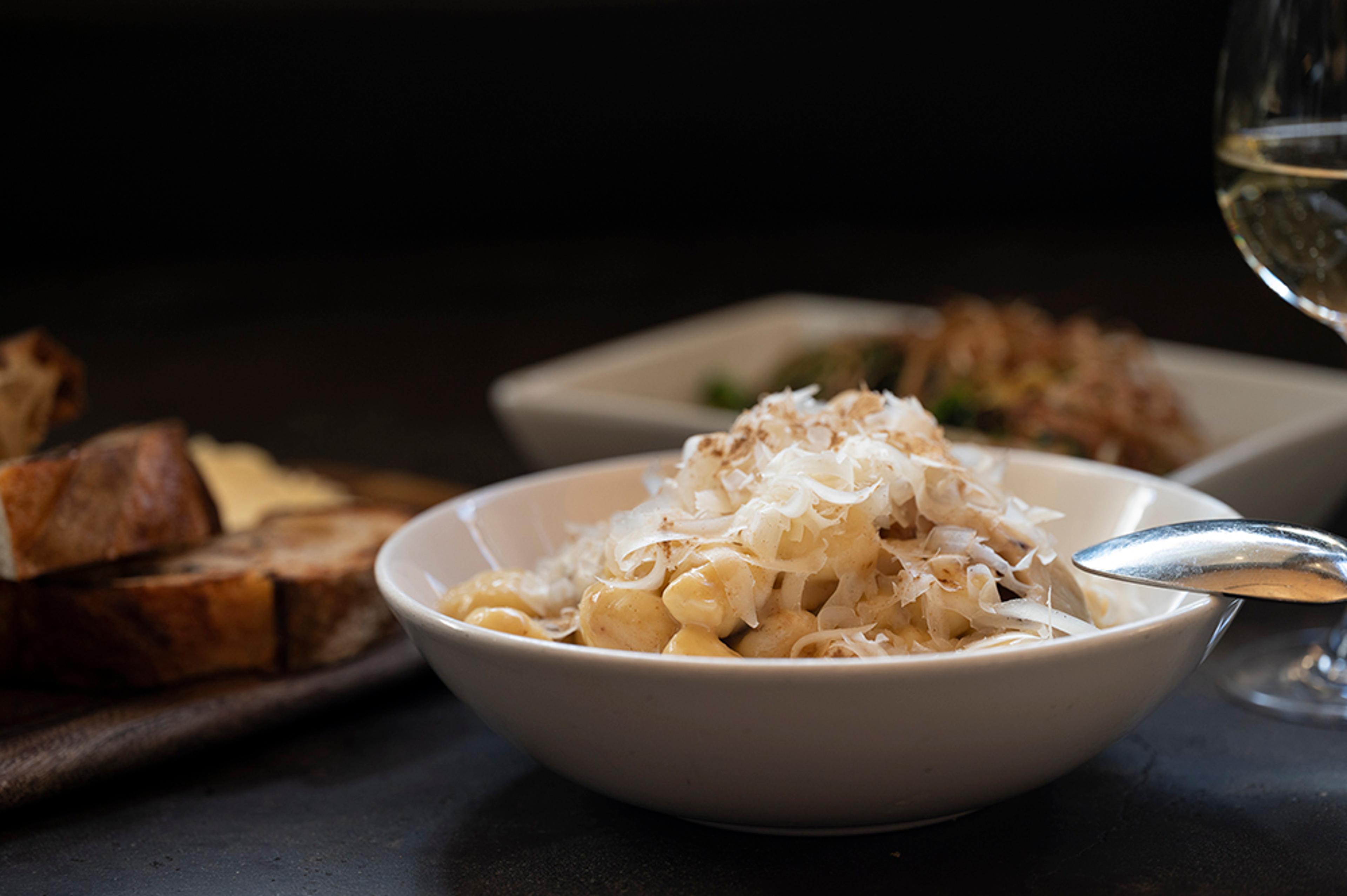 potato gnocchi topped with fried bread crumbs and parmesan