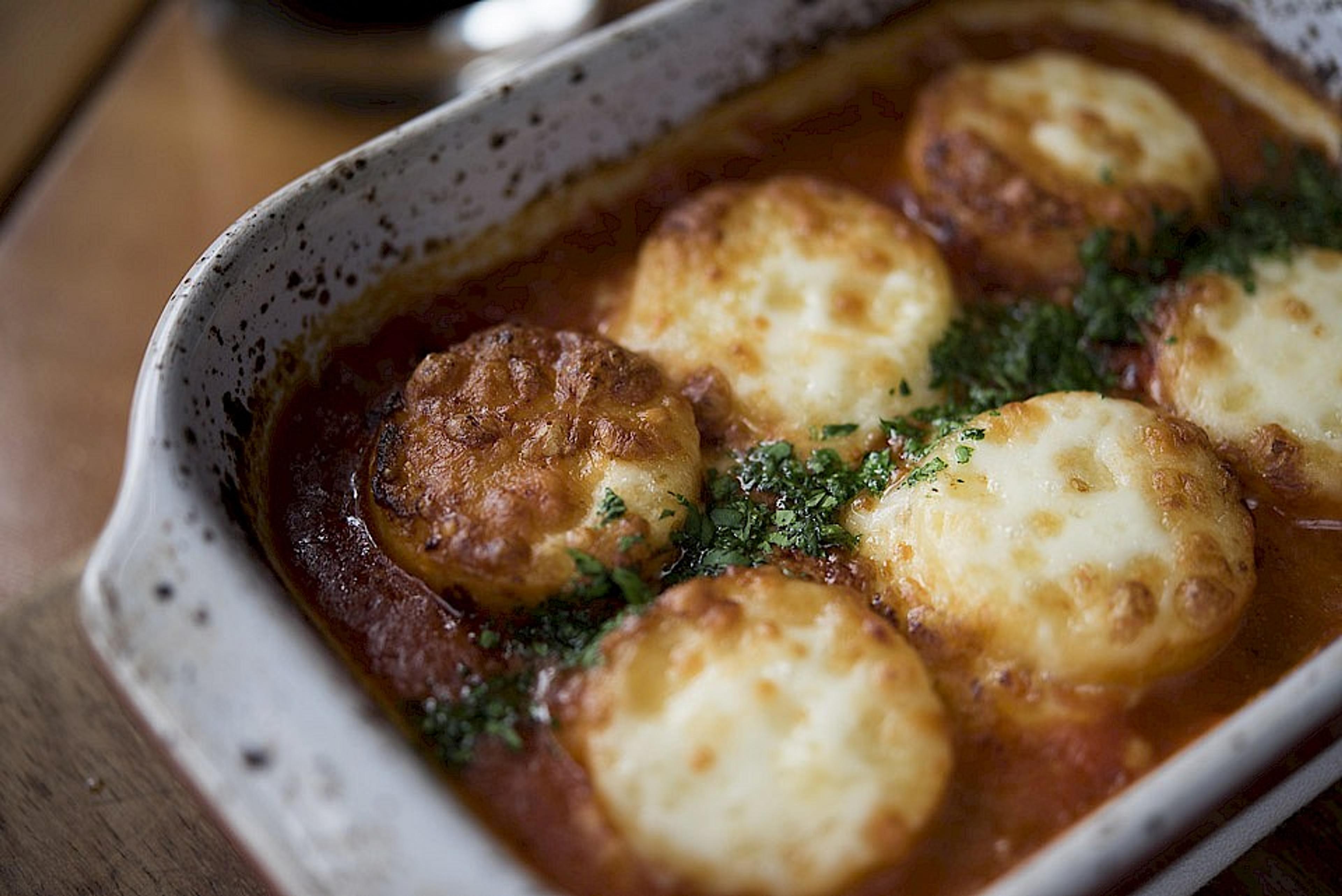 Baked semolina gnocchi alla romana