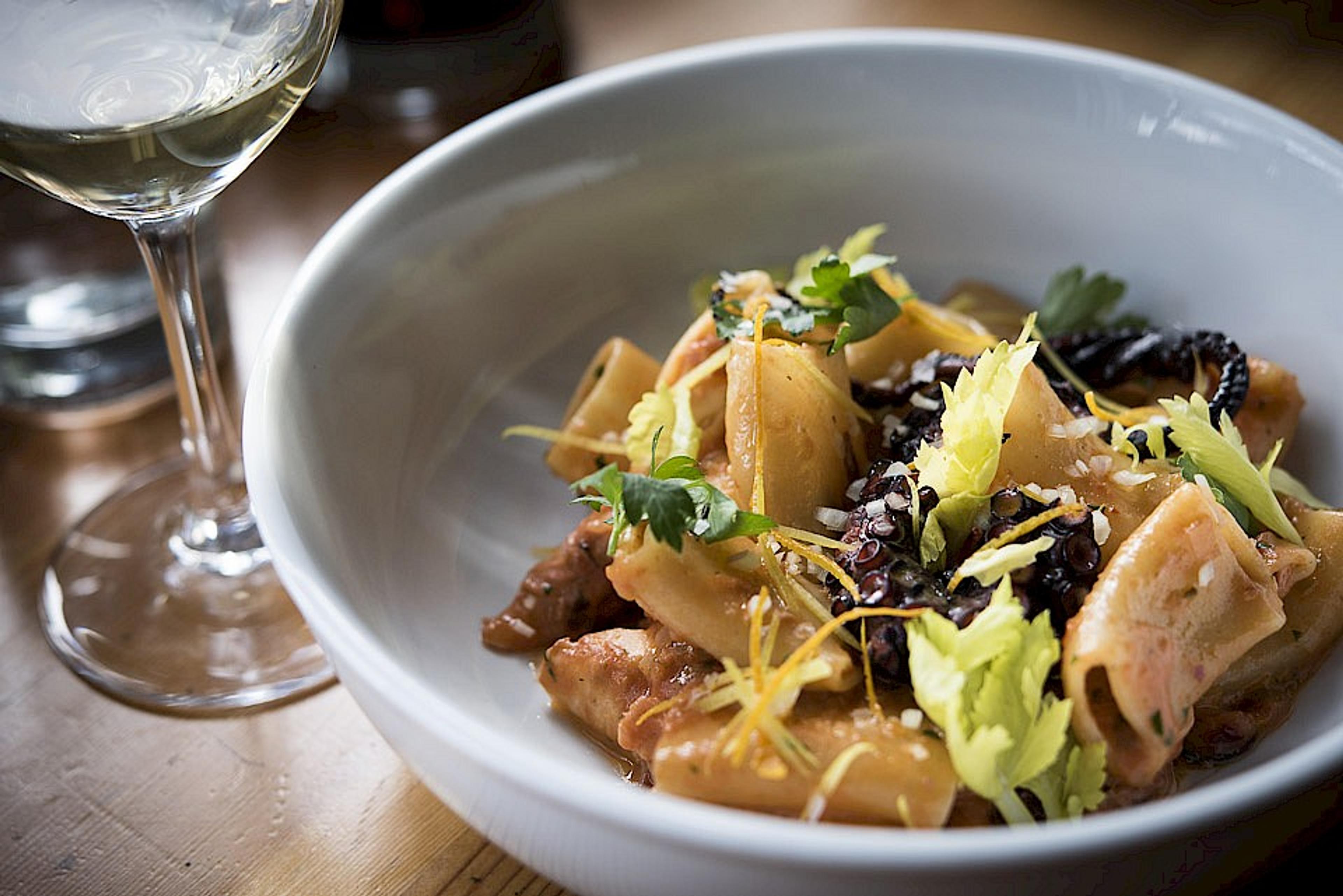 Naccheri pasta with grilled octopus, celery leaf, lemon zest